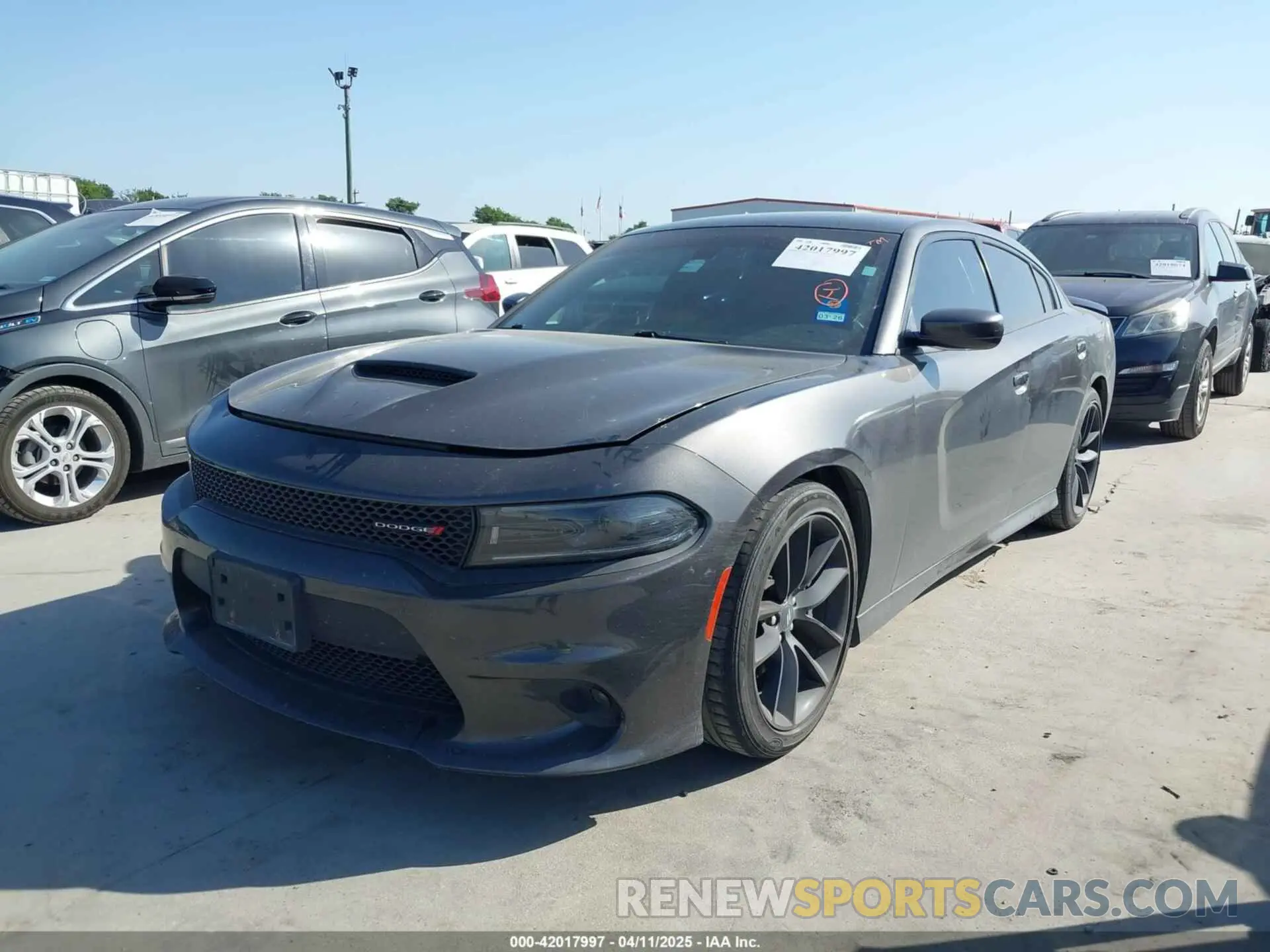 2 fotografías del automóvil dañado 2C3CDXHG3NH114268 DODGE CHARGER 2022