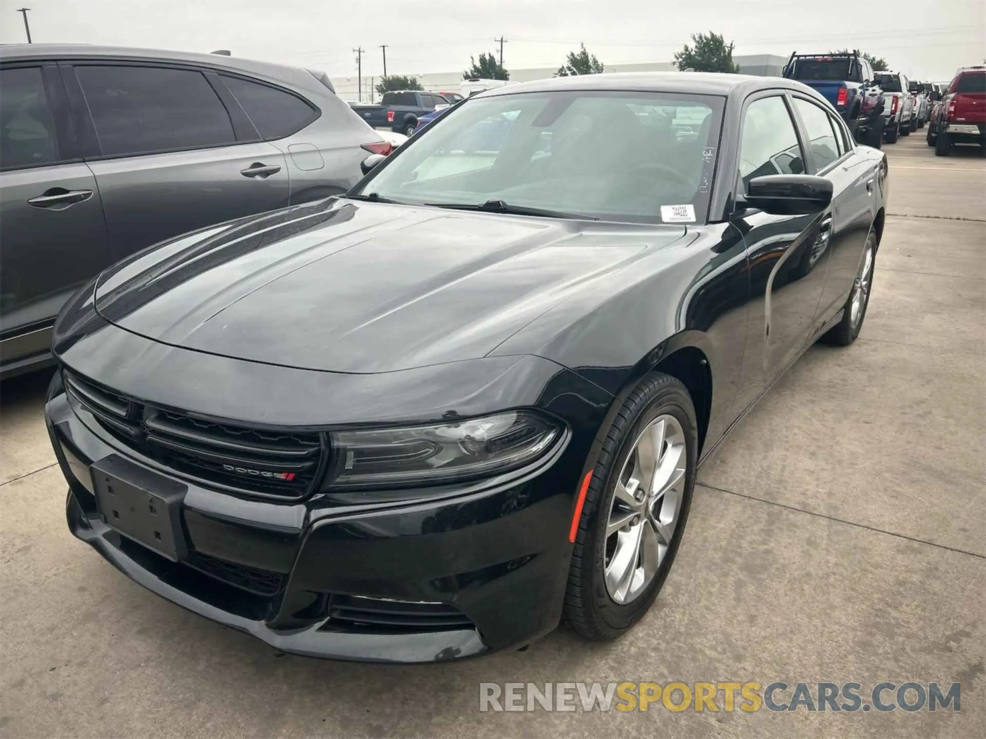 14 fotografías del automóvil dañado 2C3CDXJG9NH120473 DODGE CHARGER 2022