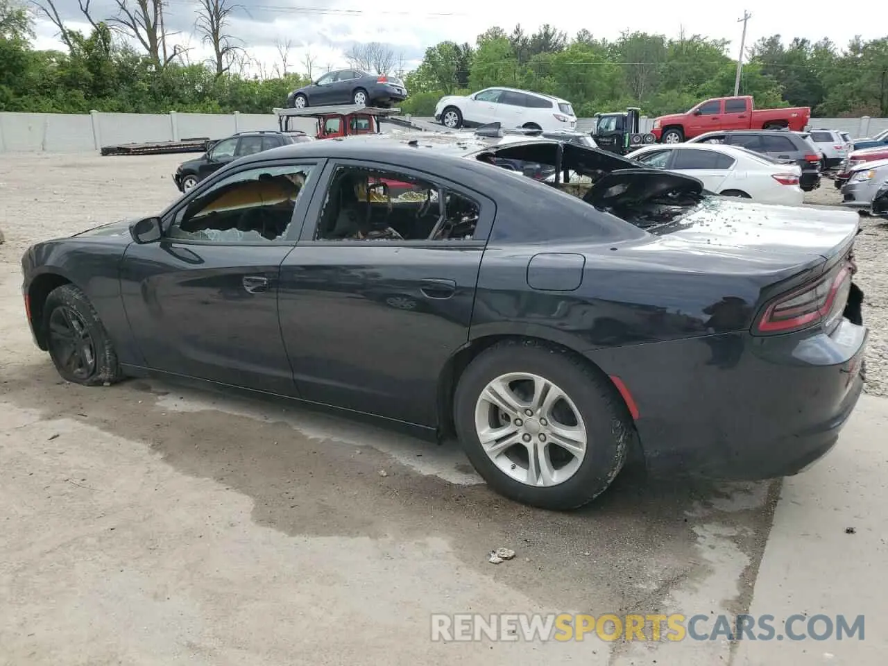2 fotografías del automóvil dañado 2C3CDXBG0PH531147 DODGE CHARGER 2023