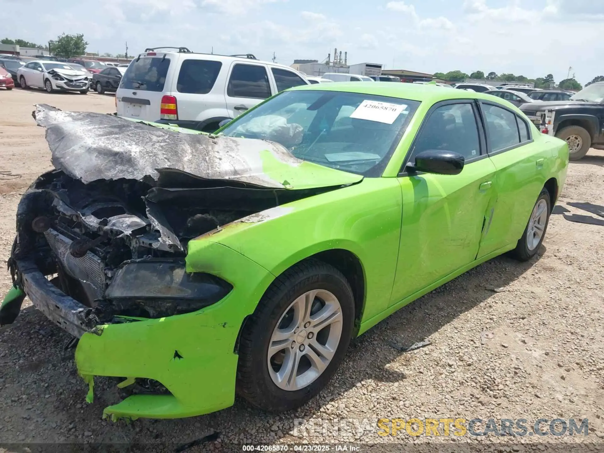 2 fotografías del automóvil dañado 2C3CDXBG1PH640152 DODGE CHARGER 2023
