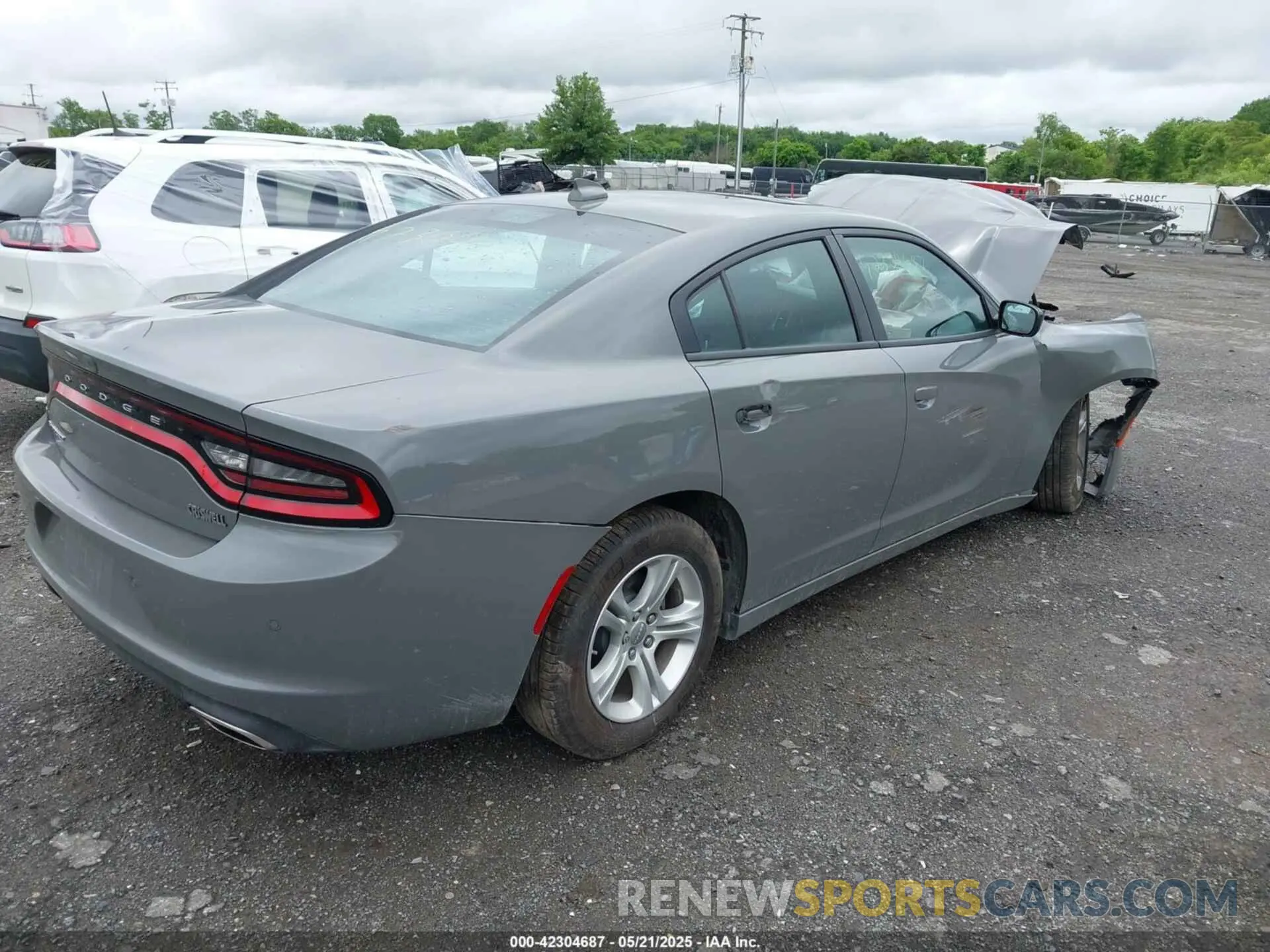 4 fotografías del automóvil dañado 2C3CDXBG1PH674849 DODGE CHARGER 2023