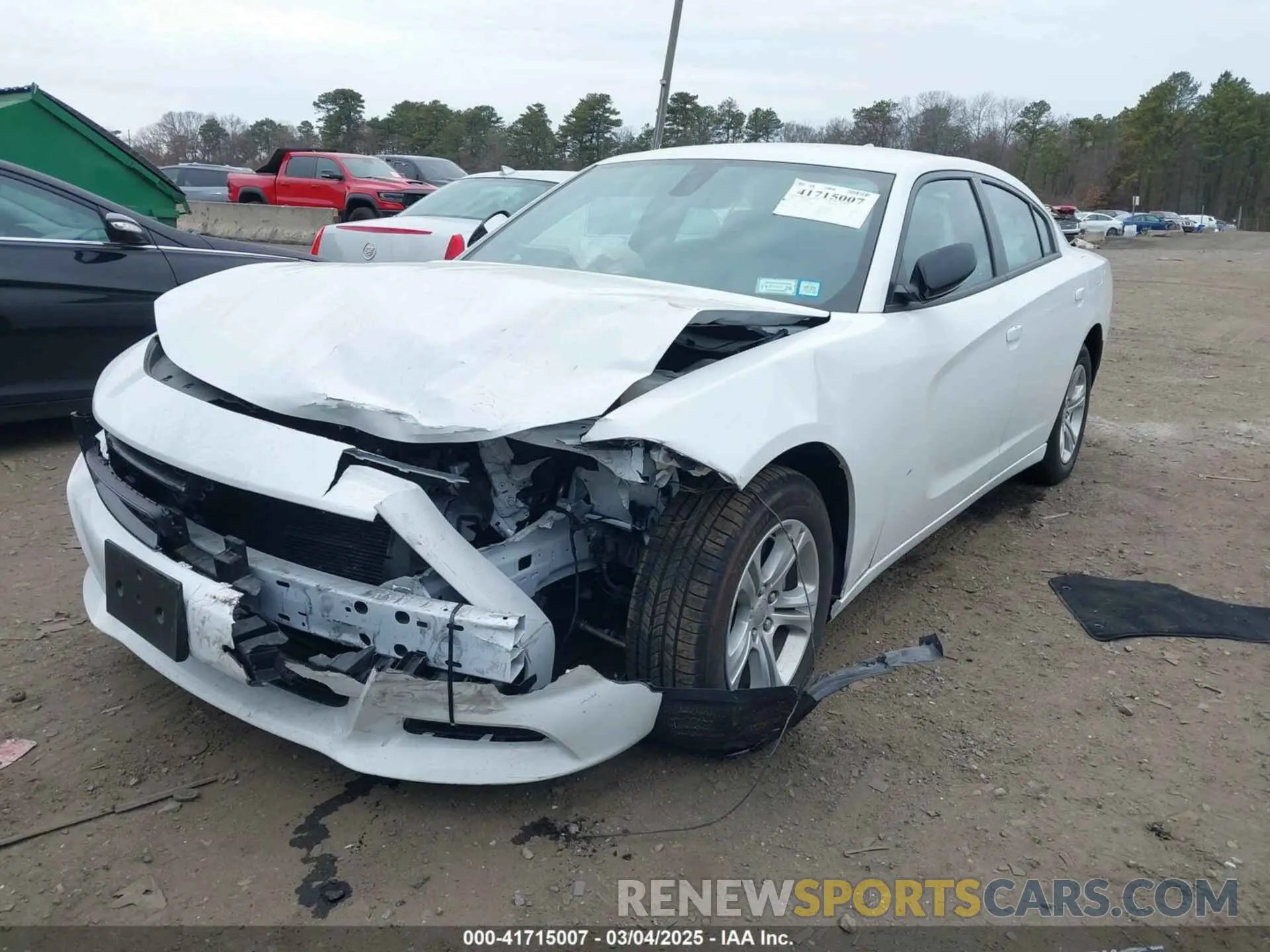 2 fotografías del automóvil dañado 2C3CDXBG1PH699461 DODGE CHARGER 2023