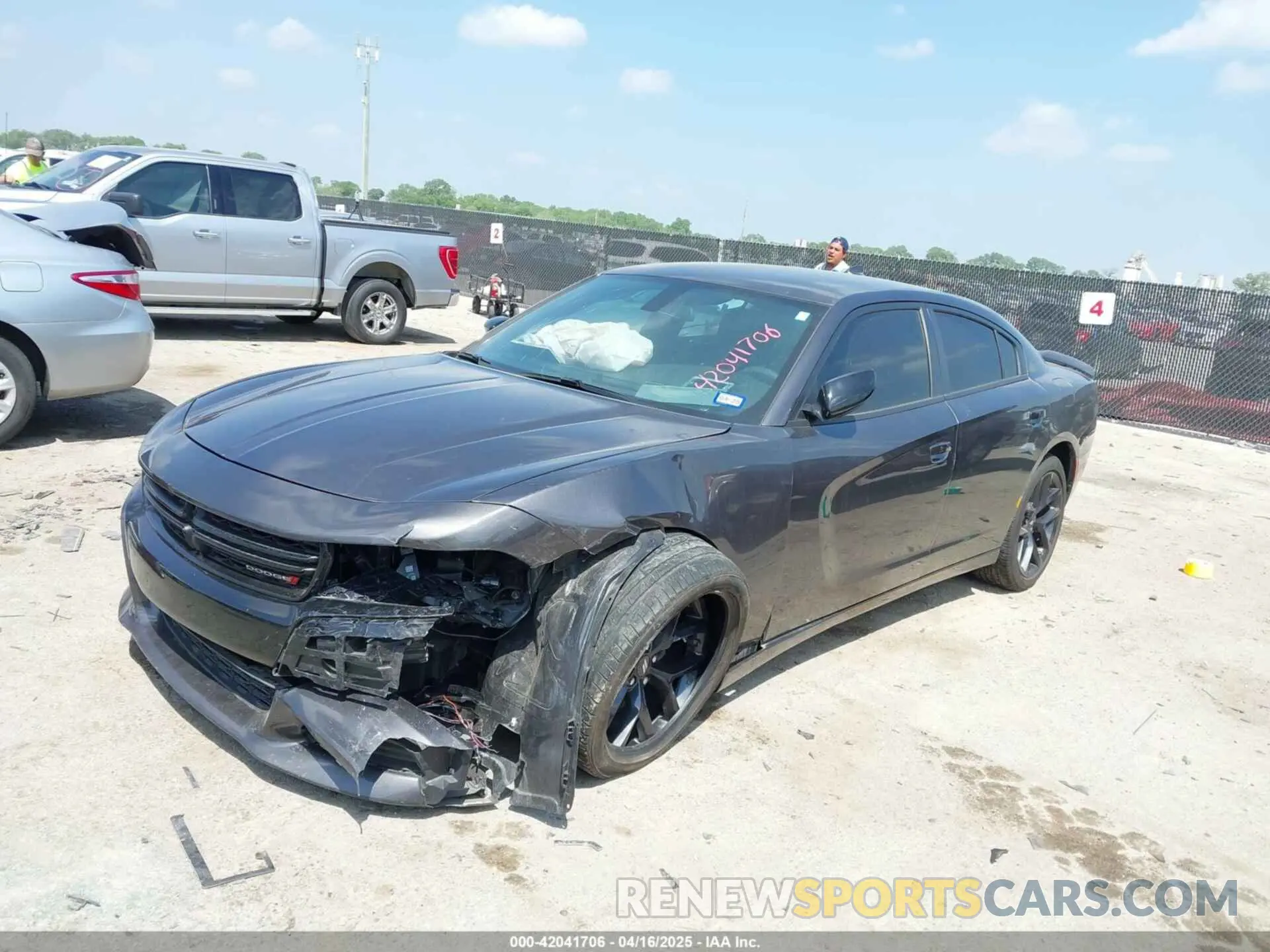 2 fotografías del automóvil dañado 2C3CDXBG2PH523647 DODGE CHARGER 2023