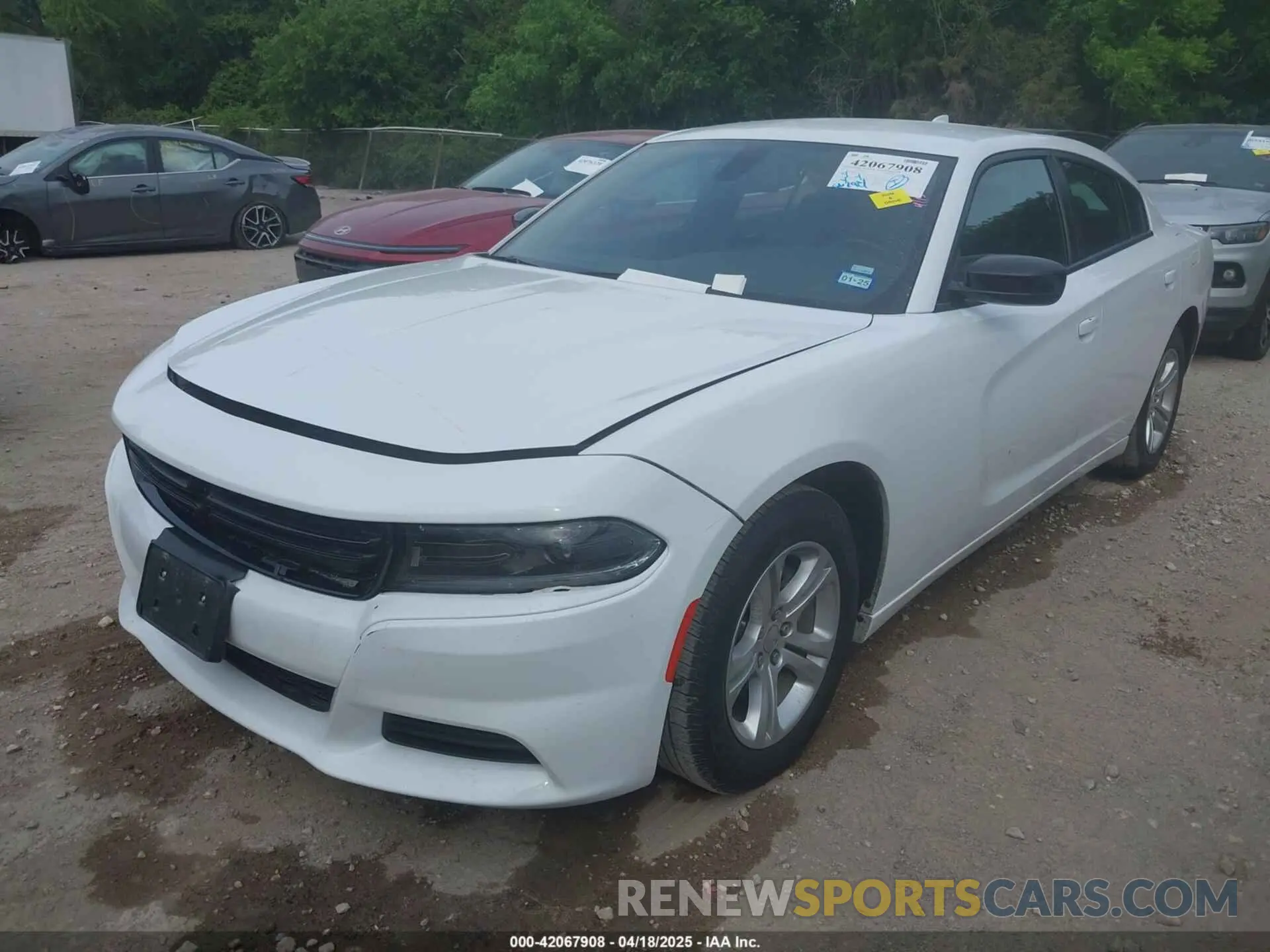 2 fotografías del automóvil dañado 2C3CDXBG2PH530257 DODGE CHARGER 2023