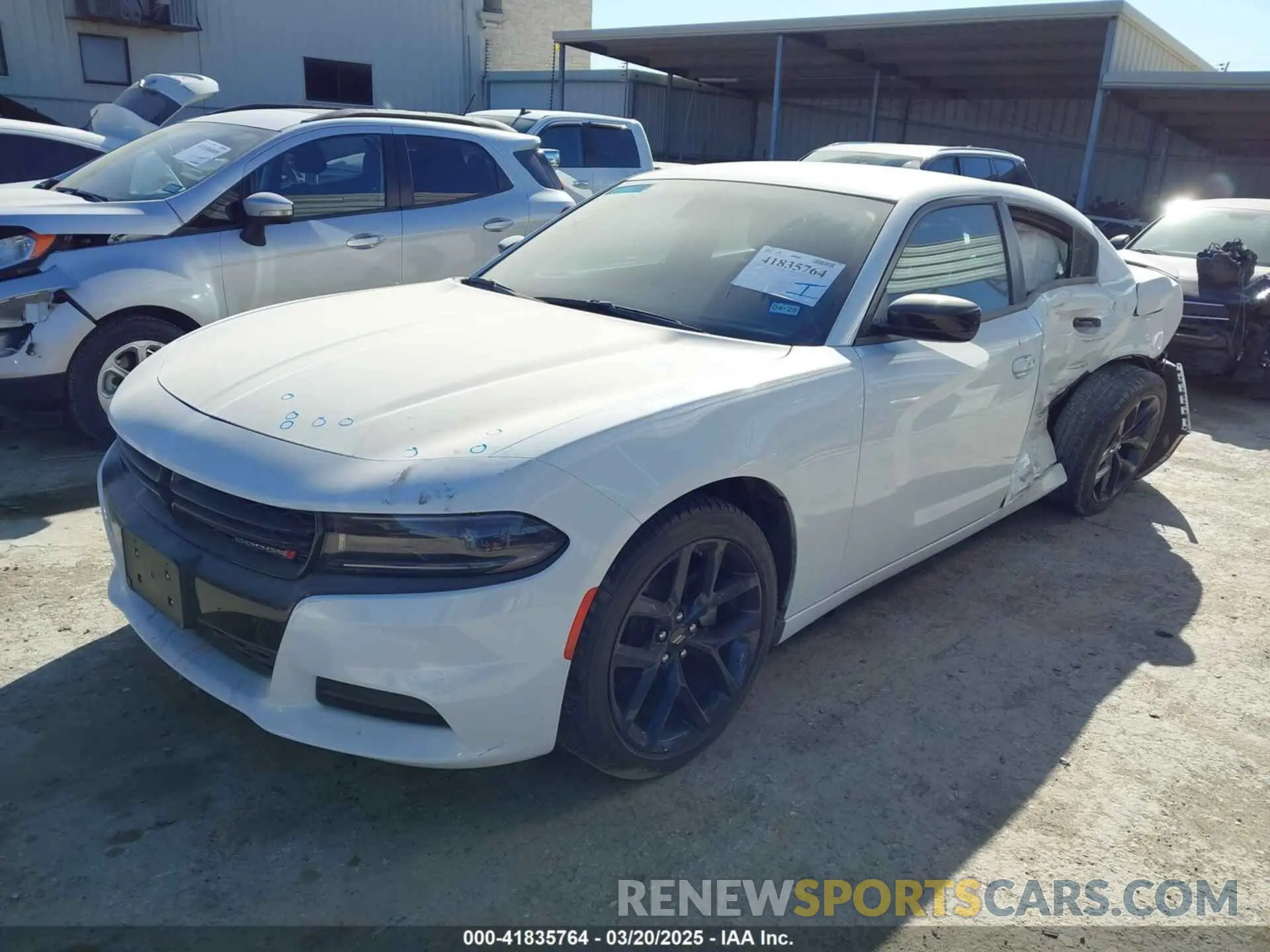 2 fotografías del automóvil dañado 2C3CDXBG2PH532025 DODGE CHARGER 2023