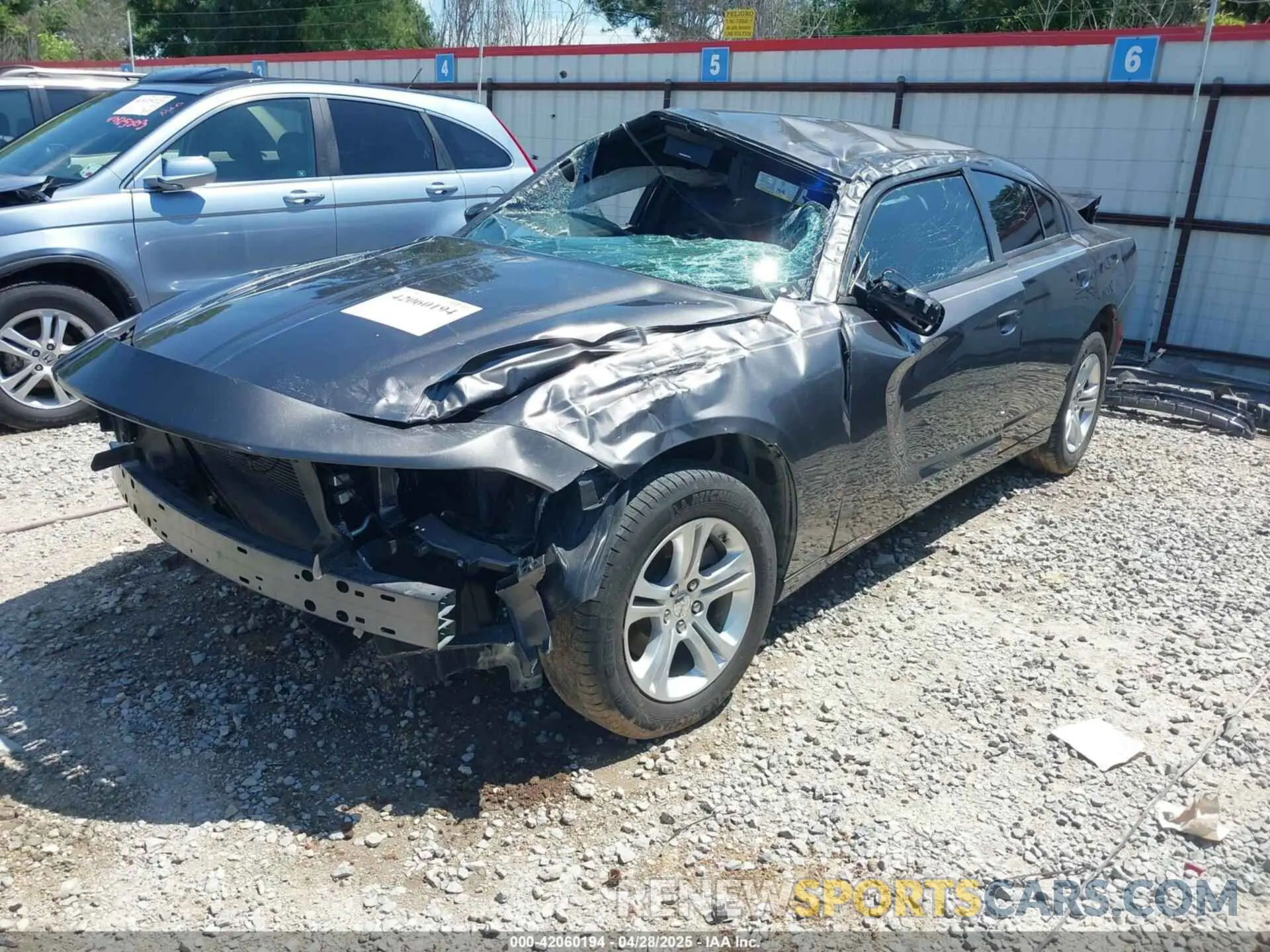 2 fotografías del automóvil dañado 2C3CDXBG2PH609668 DODGE CHARGER 2023
