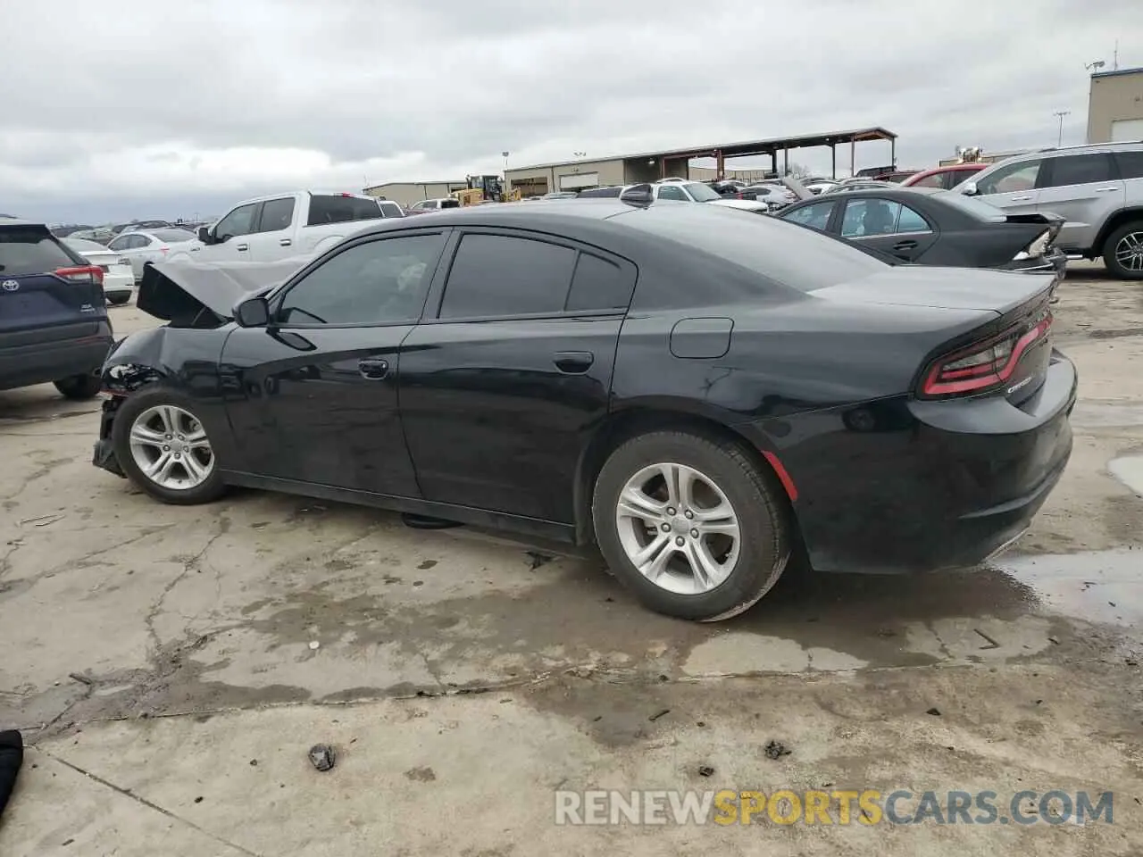 2 fotografías del automóvil dañado 2C3CDXBG2PH664279 DODGE CHARGER 2023