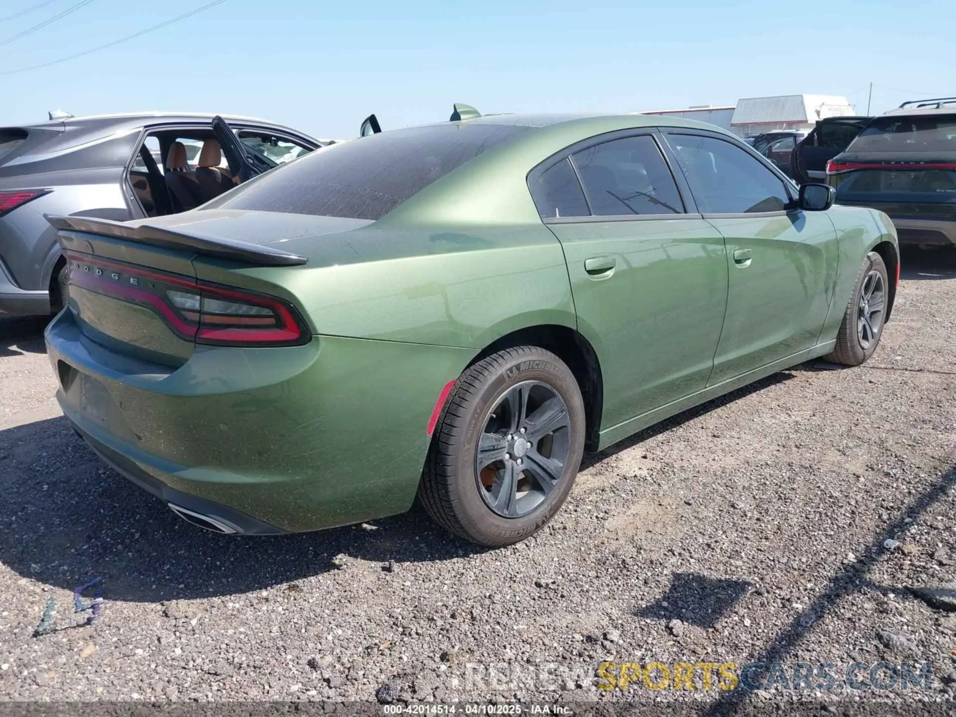 4 fotografías del automóvil dañado 2C3CDXBG2PH701539 DODGE CHARGER 2023