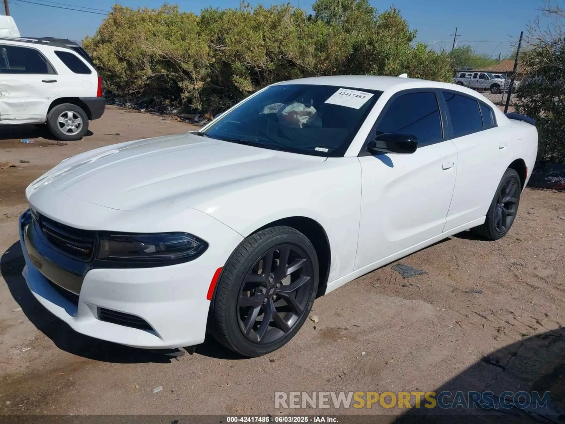 2 fotografías del automóvil dañado 2C3CDXBG4PH623216 DODGE CHARGER 2023