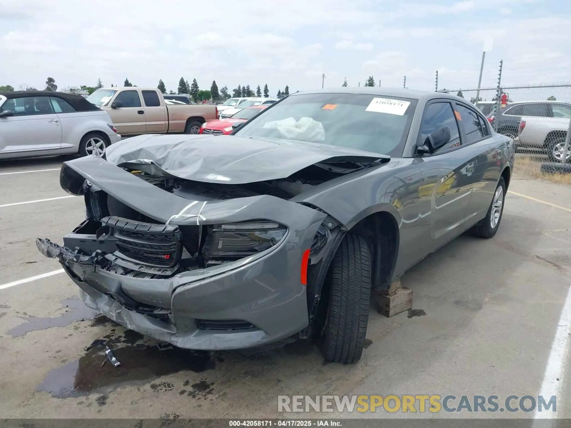 2 fotografías del automóvil dañado 2C3CDXBG4PH703423 DODGE CHARGER 2023