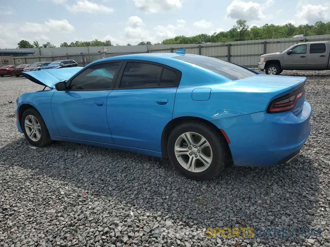 2 fotografías del automóvil dañado 2C3CDXBG5PH595085 DODGE CHARGER 2023