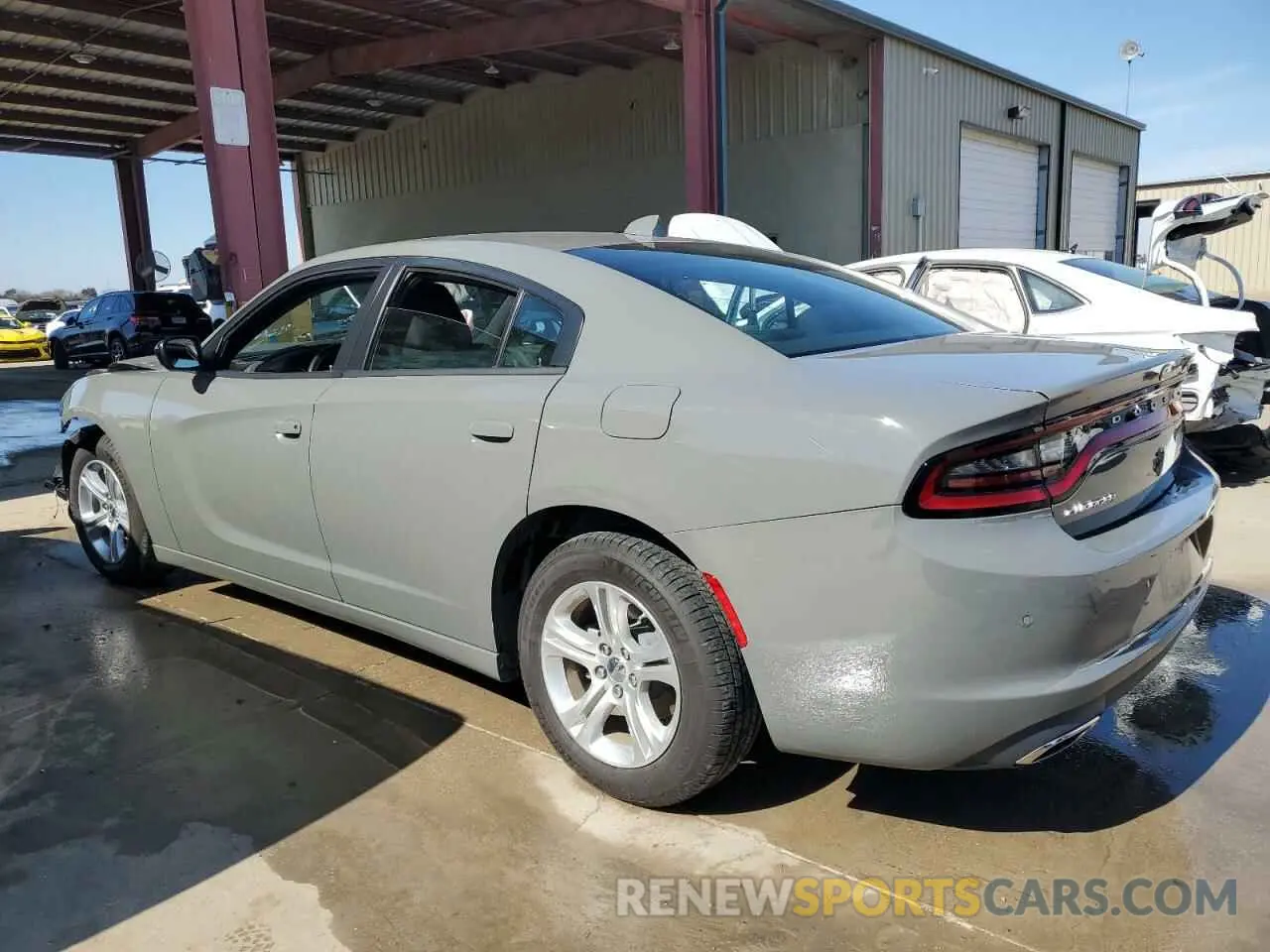 2 fotografías del automóvil dañado 2C3CDXBG7PH702914 DODGE CHARGER 2023