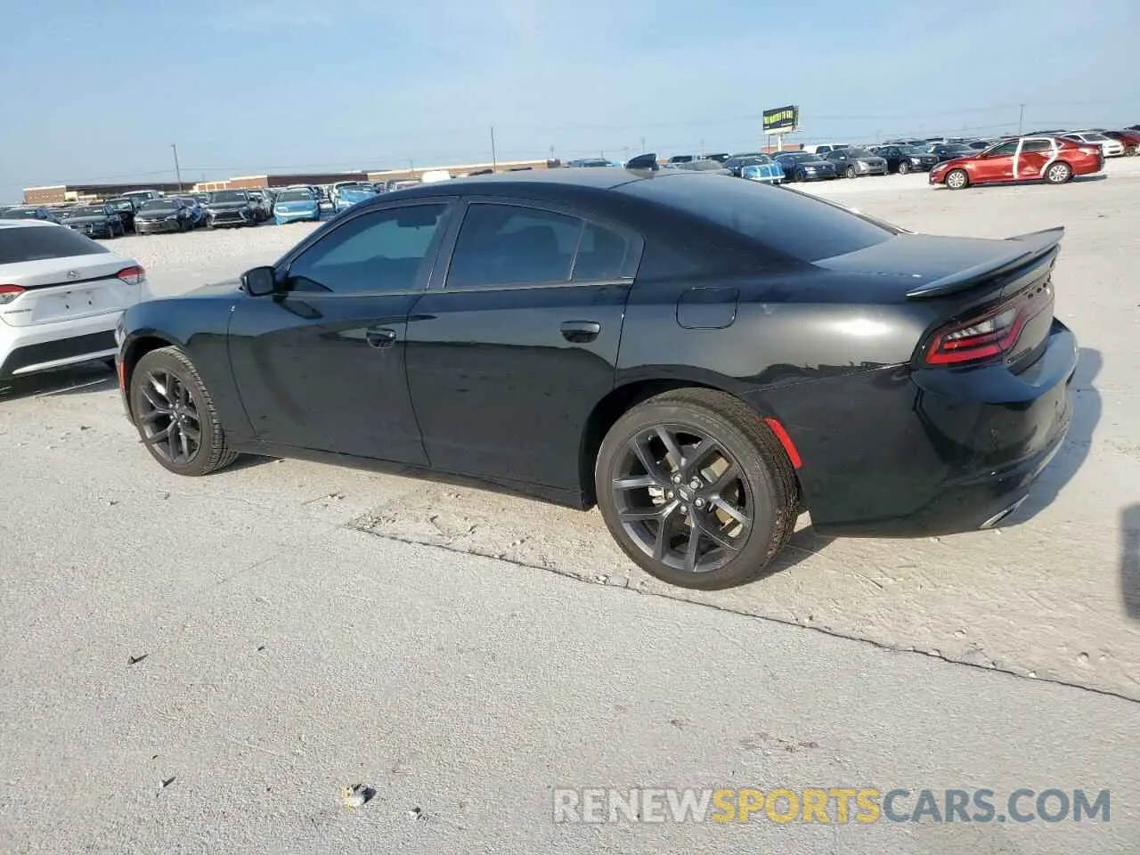 2 fotografías del automóvil dañado 2C3CDXBG8PH599096 DODGE CHARGER 2023