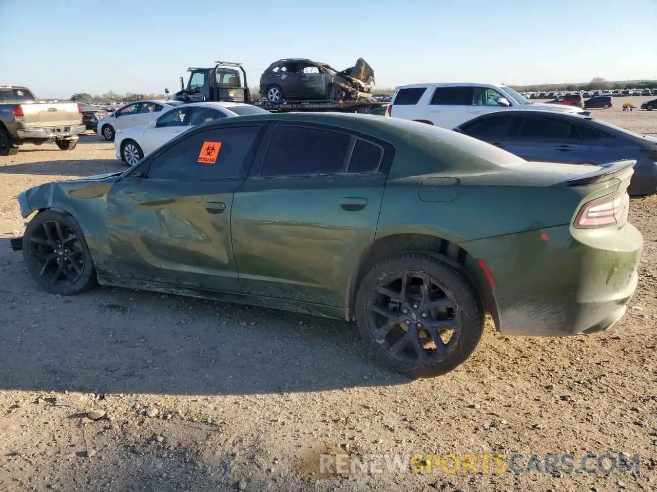 2 fotografías del automóvil dañado 2C3CDXBG9PH525024 DODGE CHARGER 2023