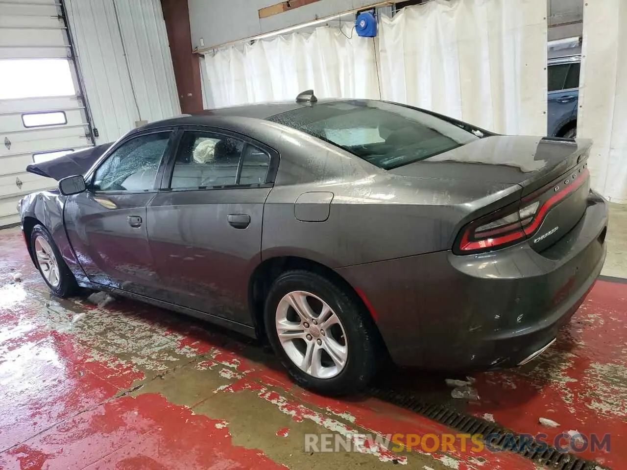 2 fotografías del automóvil dañado 2C3CDXBG9PH531258 DODGE CHARGER 2023