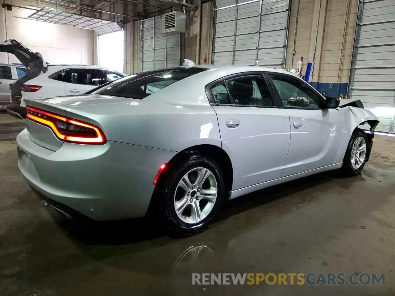 3 fotografías del automóvil dañado 2C3CDXBGXPH659637 DODGE CHARGER 2023