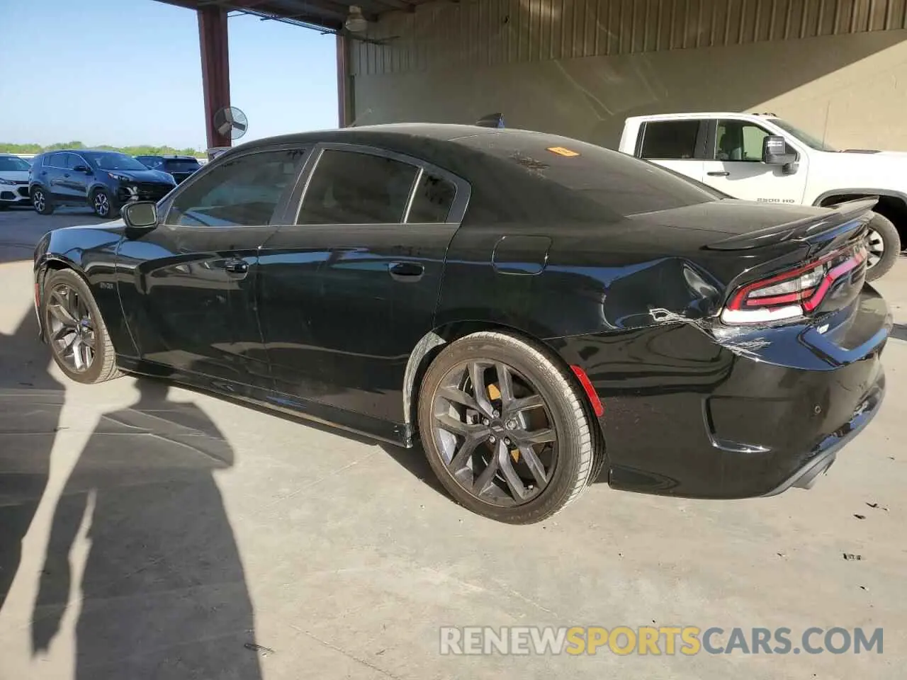 2 fotografías del automóvil dañado 2C3CDXCT0PH699320 DODGE CHARGER 2023