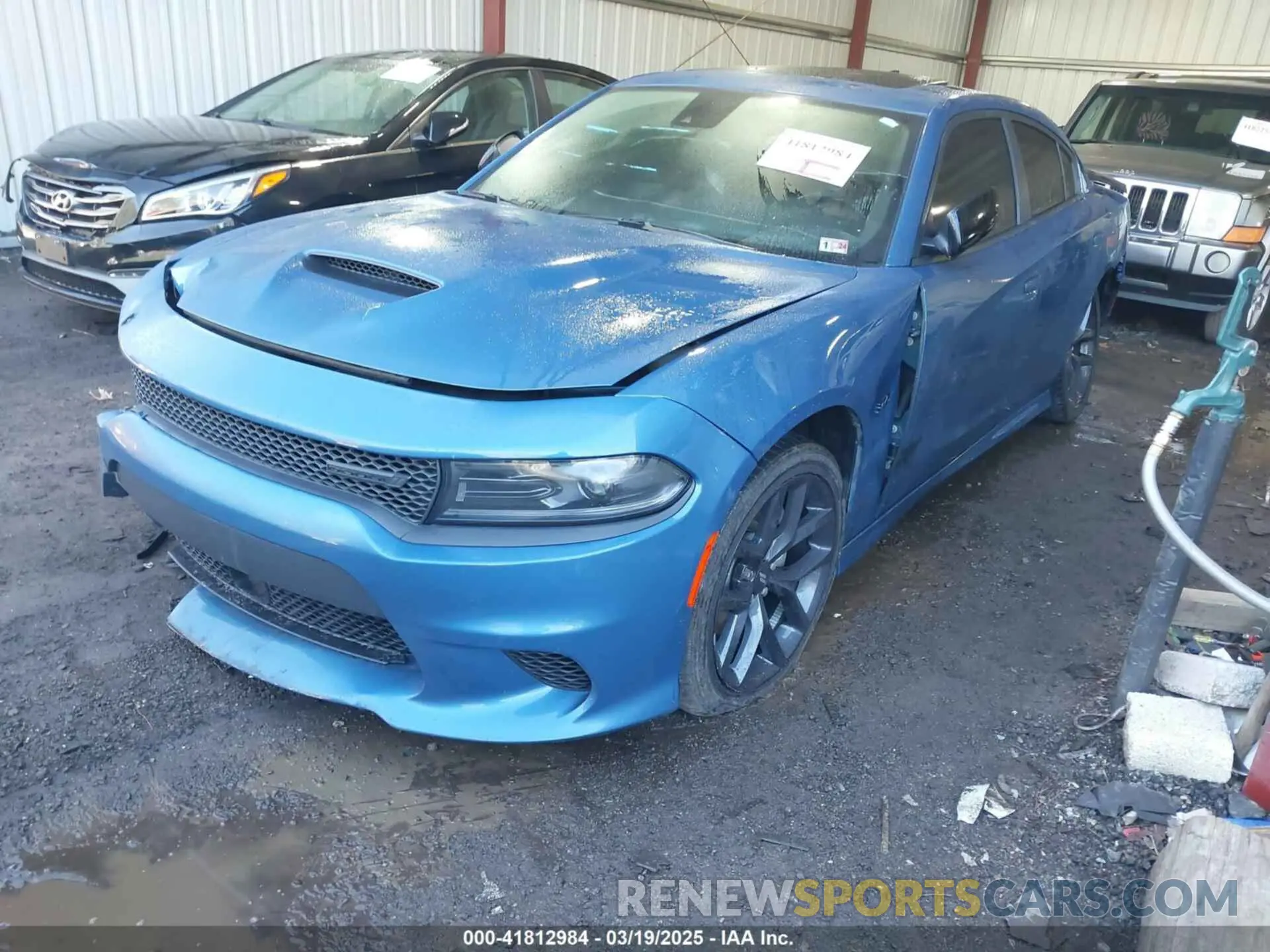 2 fotografías del automóvil dañado 2C3CDXCT1PH519049 DODGE CHARGER 2023
