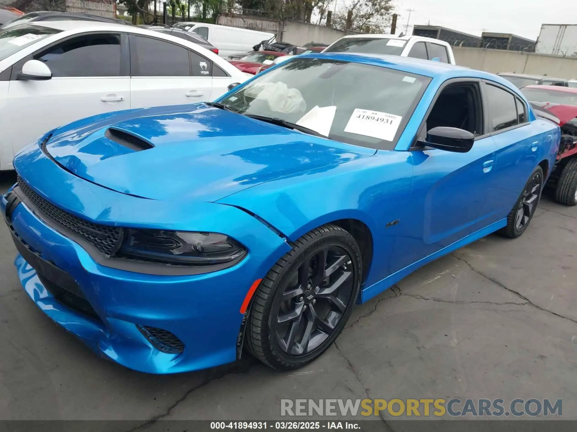 2 fotografías del automóvil dañado 2C3CDXCT4PH700629 DODGE CHARGER 2023