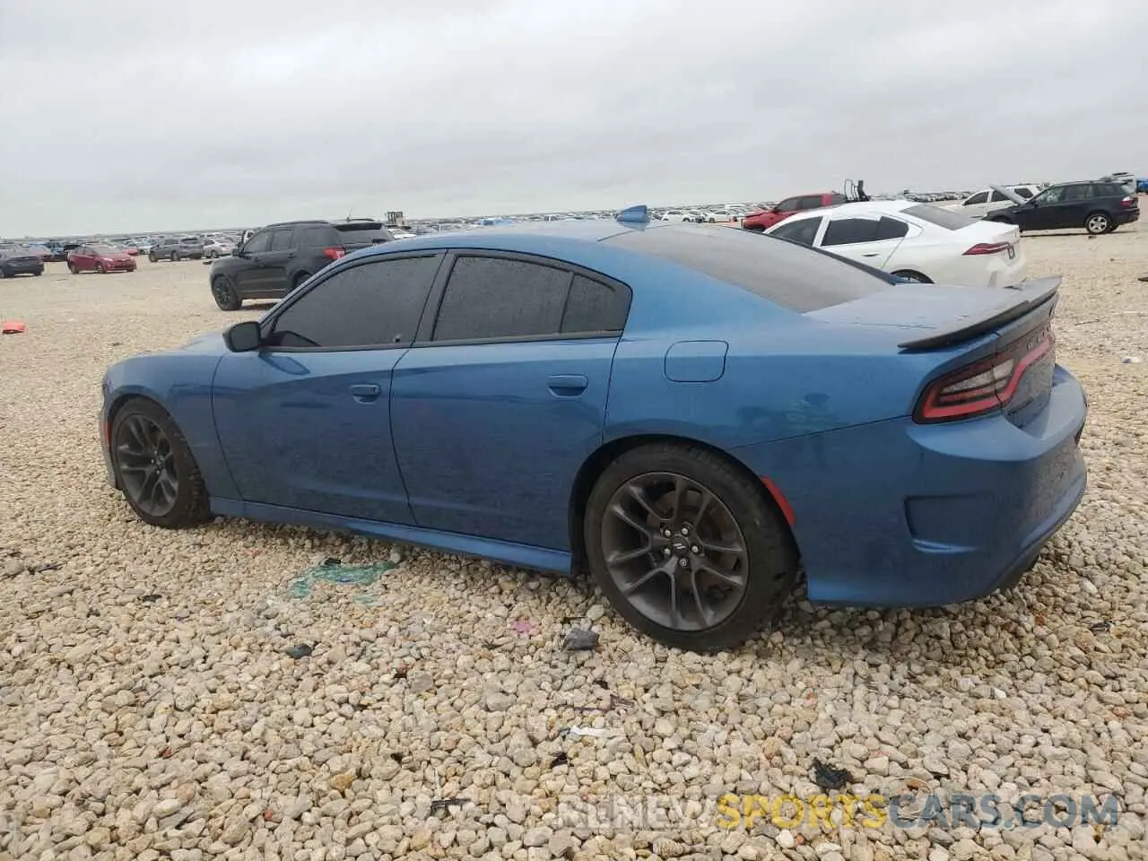 2 fotografías del automóvil dañado 2C3CDXGJ4PH672811 DODGE CHARGER 2023
