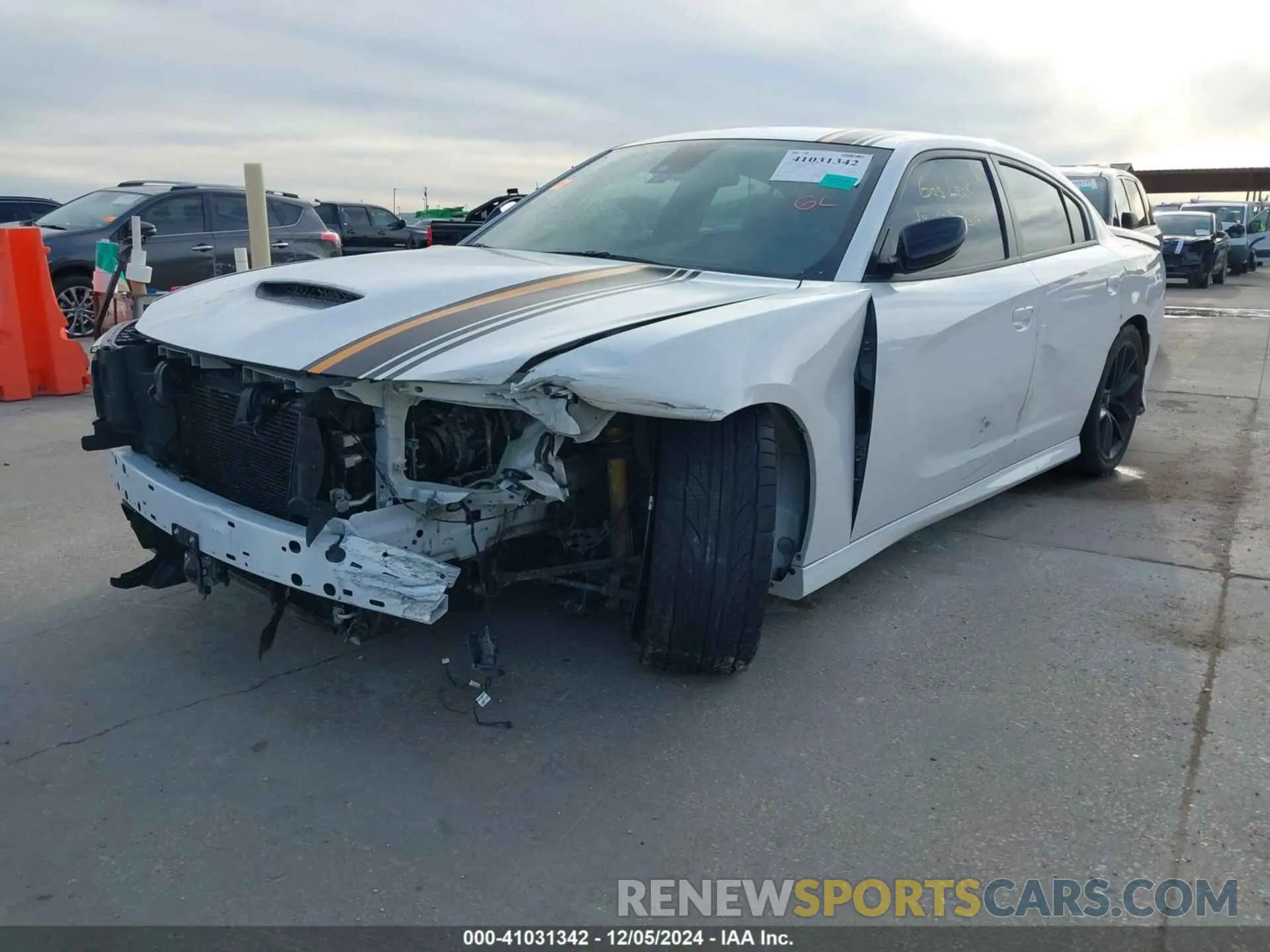 2 fotografías del automóvil dañado 2C3CDXHG1PH515725 DODGE CHARGER 2023