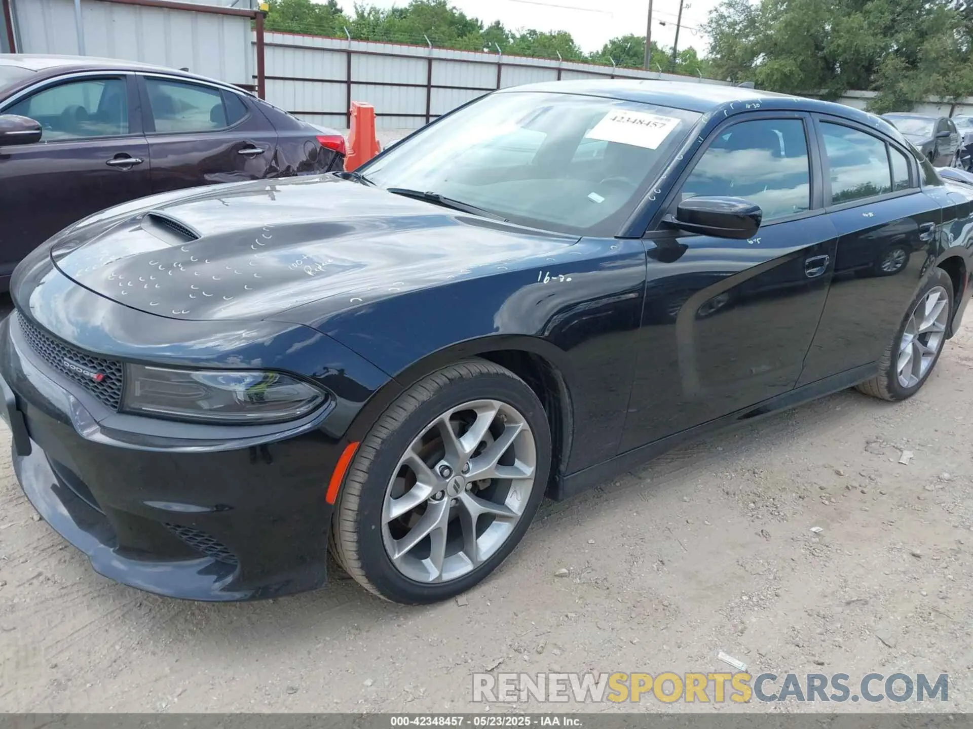 2 fotografías del automóvil dañado 2C3CDXHG3PH587915 DODGE CHARGER 2023