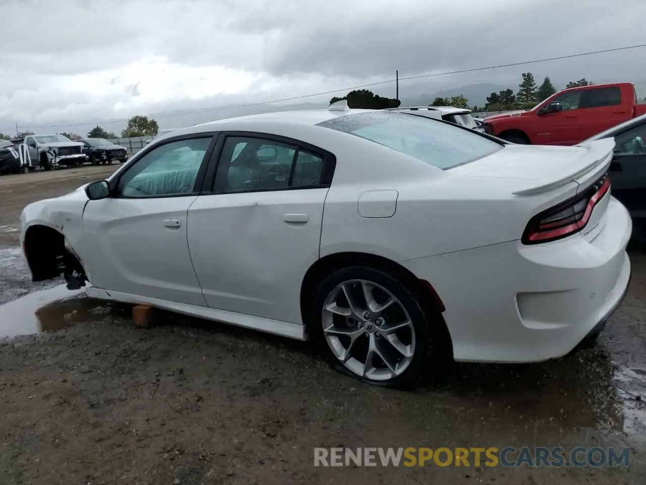 2 fotografías del automóvil dañado 2C3CDXHG5PH546850 DODGE CHARGER 2023