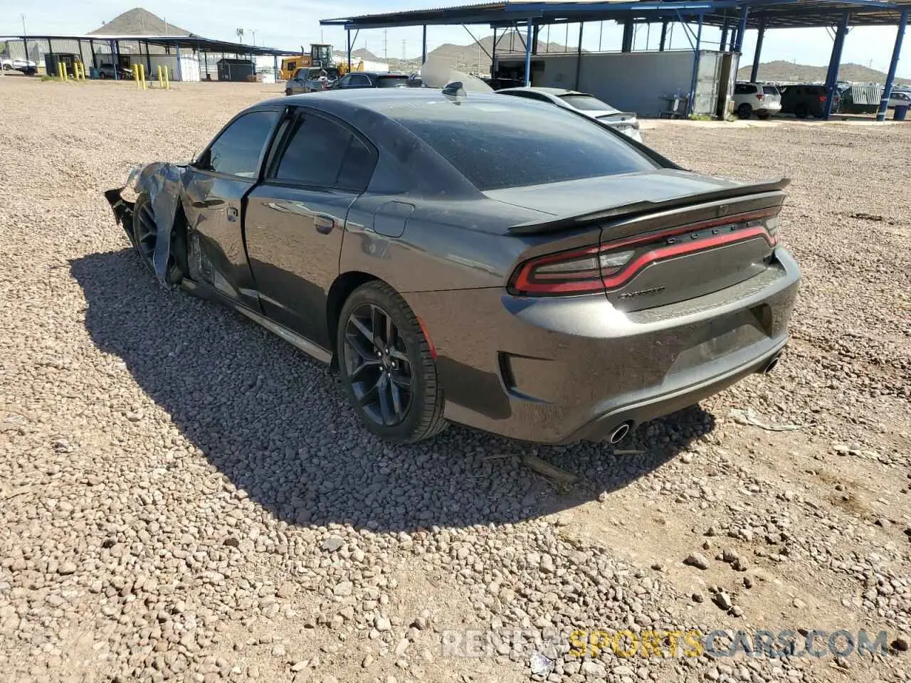 2 fotografías del automóvil dañado 2C3CDXHG6PH588332 DODGE CHARGER 2023