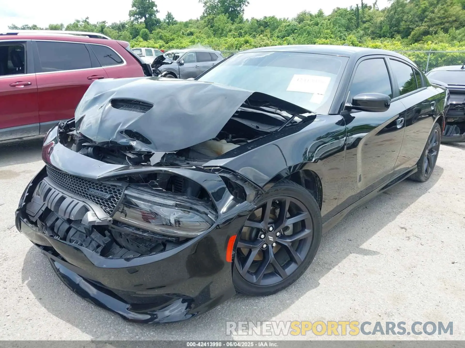 2 fotografías del automóvil dañado 2C3CDXHG7PH622679 DODGE CHARGER 2023