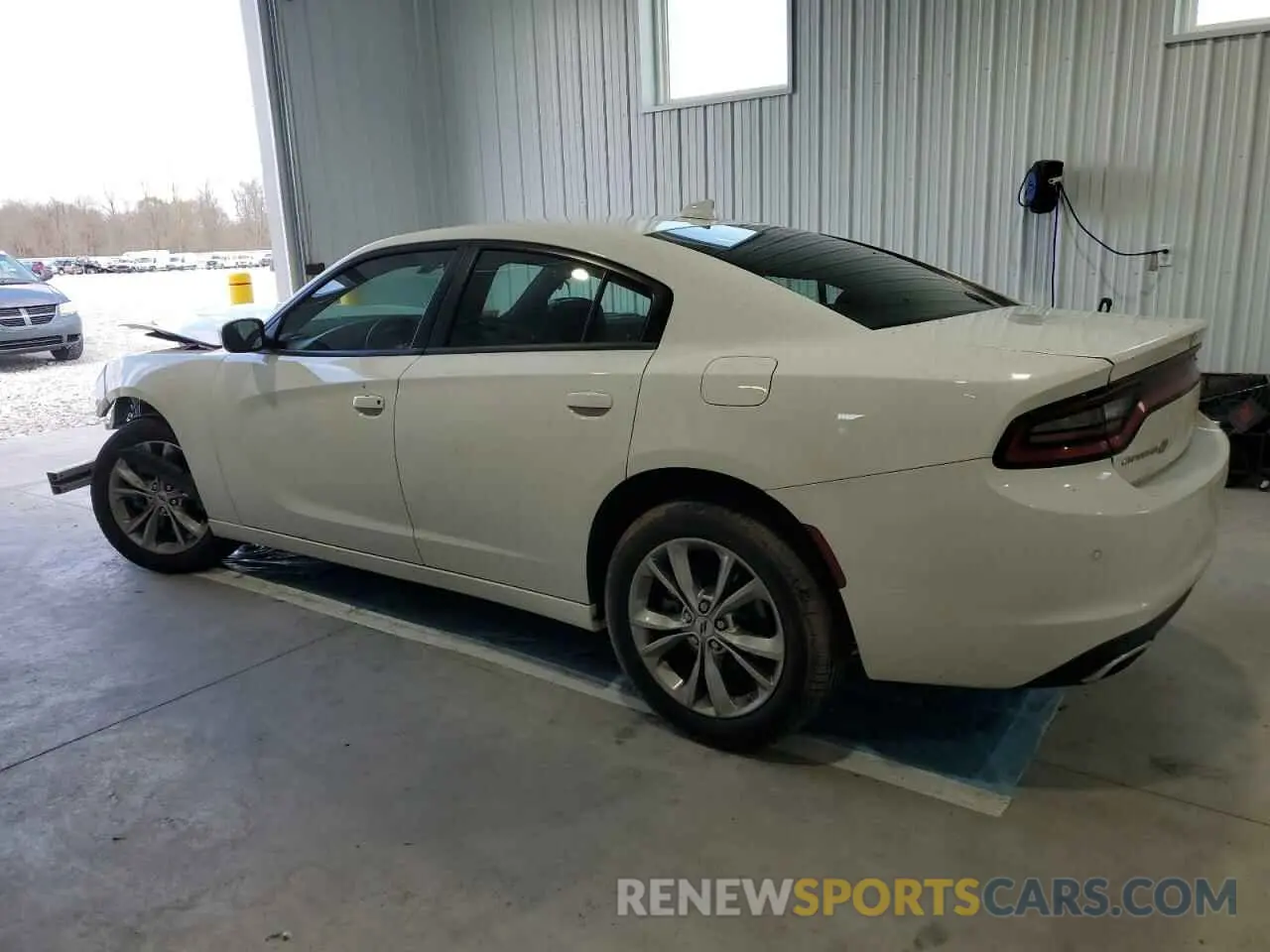 2 fotografías del automóvil dañado 2C3CDXJG2PH613740 DODGE CHARGER 2023