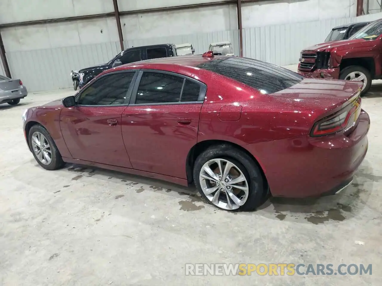2 fotografías del automóvil dañado 2C3CDXJG5PH648269 DODGE CHARGER 2023