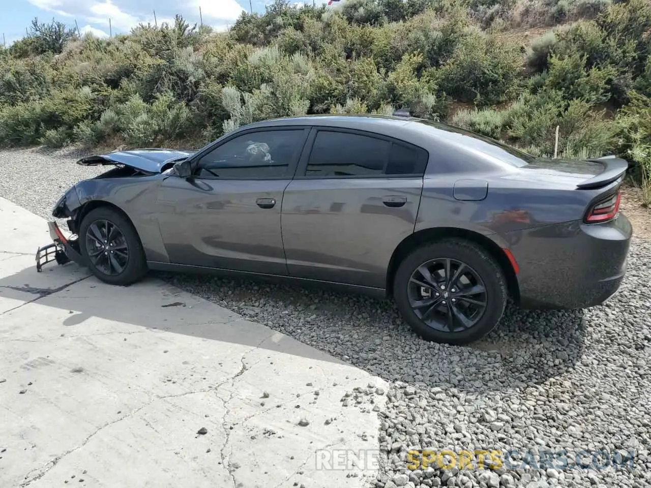 2 fotografías del automóvil dañado 2C3CDXJG5PH706025 DODGE CHARGER 2023