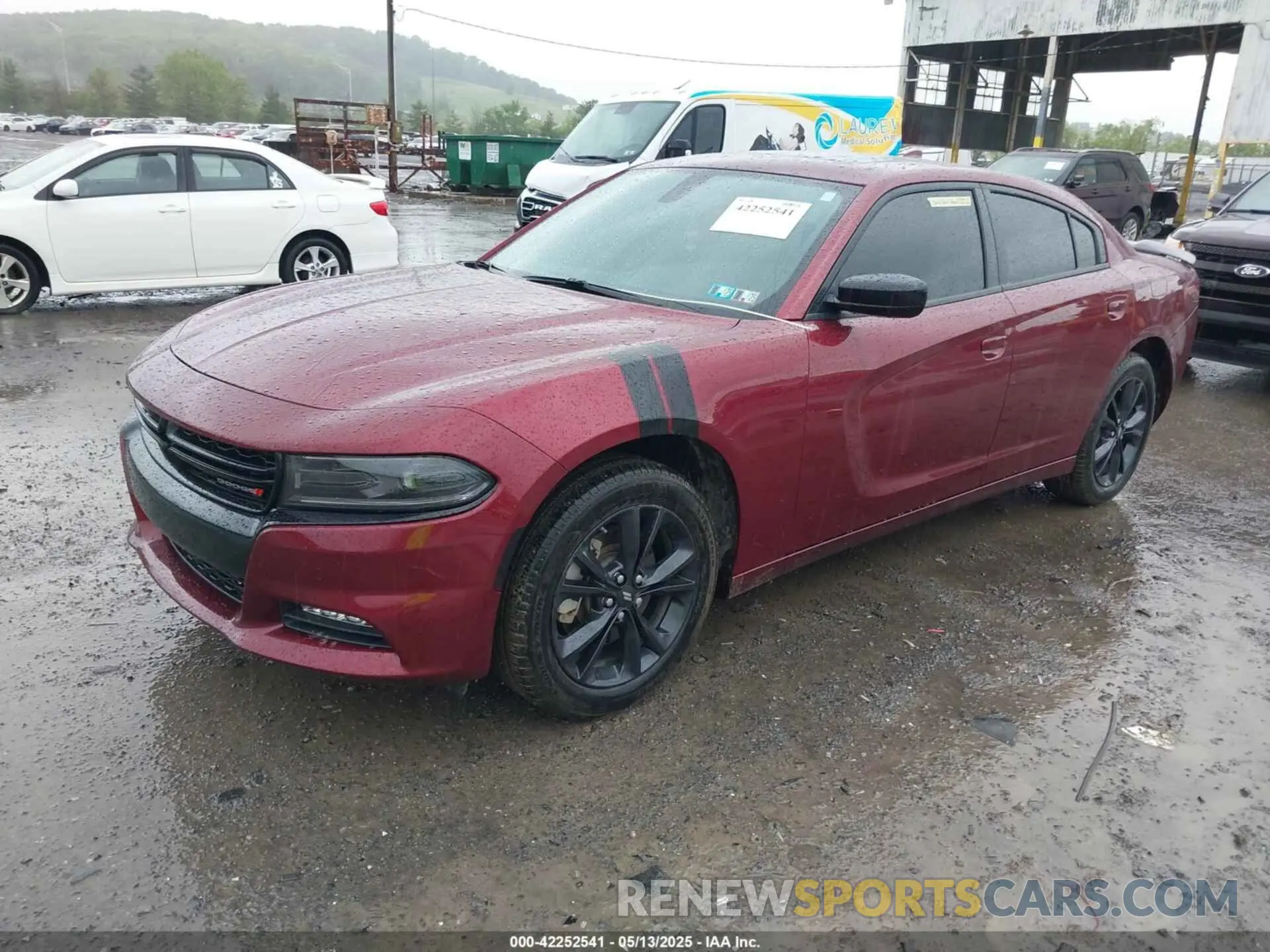2 fotografías del automóvil dañado 2C3CDXJG7PH577818 DODGE CHARGER 2023