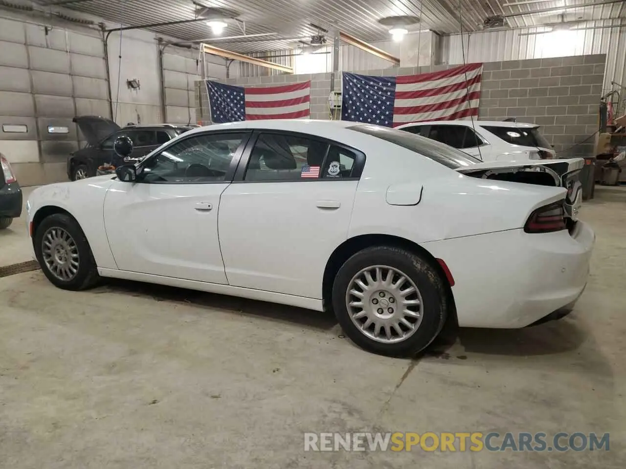 2 fotografías del automóvil dañado 2C3CDXKG4PH519907 DODGE CHARGER 2023