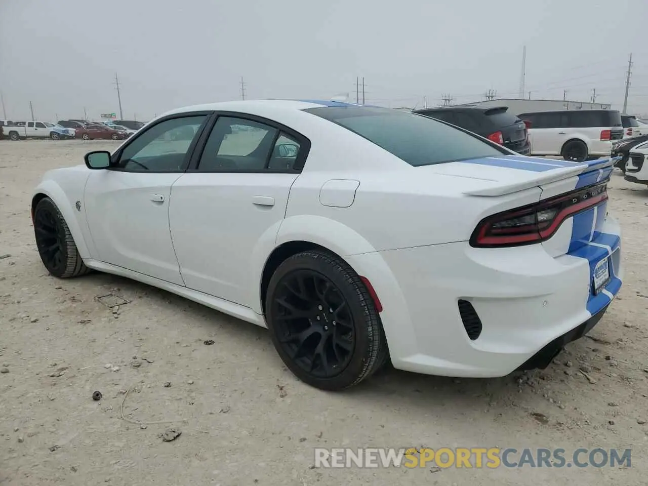 2 fotografías del automóvil dañado 2C3CDXL92PH681356 DODGE CHARGER 2023