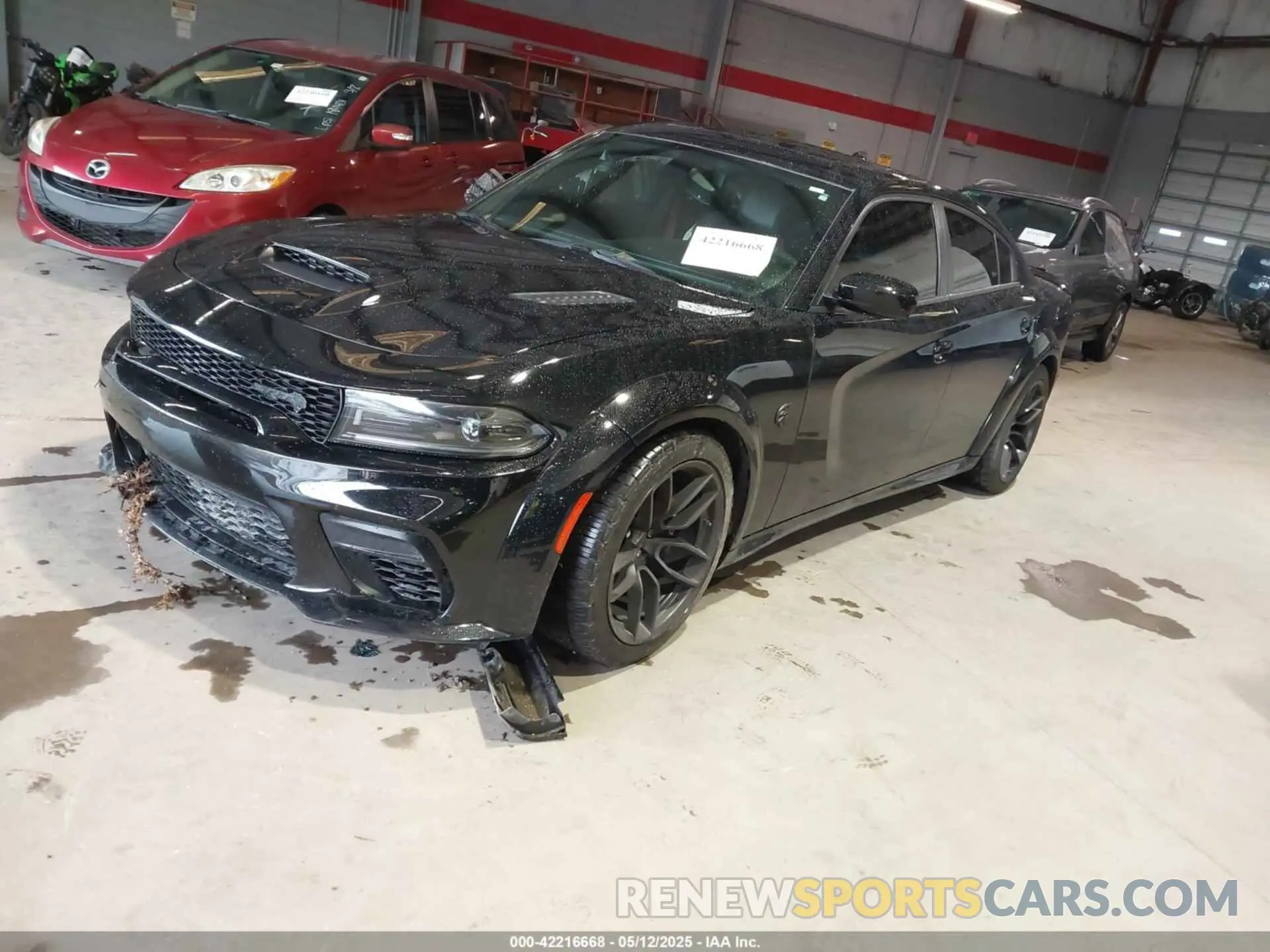 2 fotografías del automóvil dañado 2C3CDXL93PH642422 DODGE CHARGER 2023