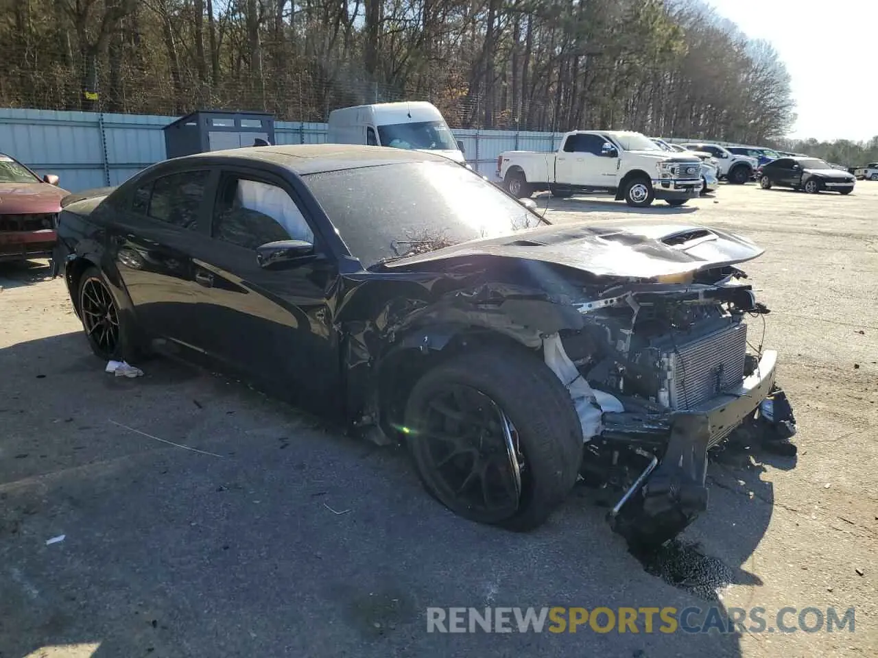 4 fotografías del automóvil dañado 2C3CDXL97PH514569 DODGE CHARGER 2023