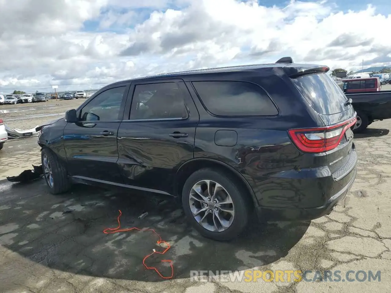 2 fotografías del automóvil dañado 1C4SDHCT3KC582145 DODGE DURANGO 2019