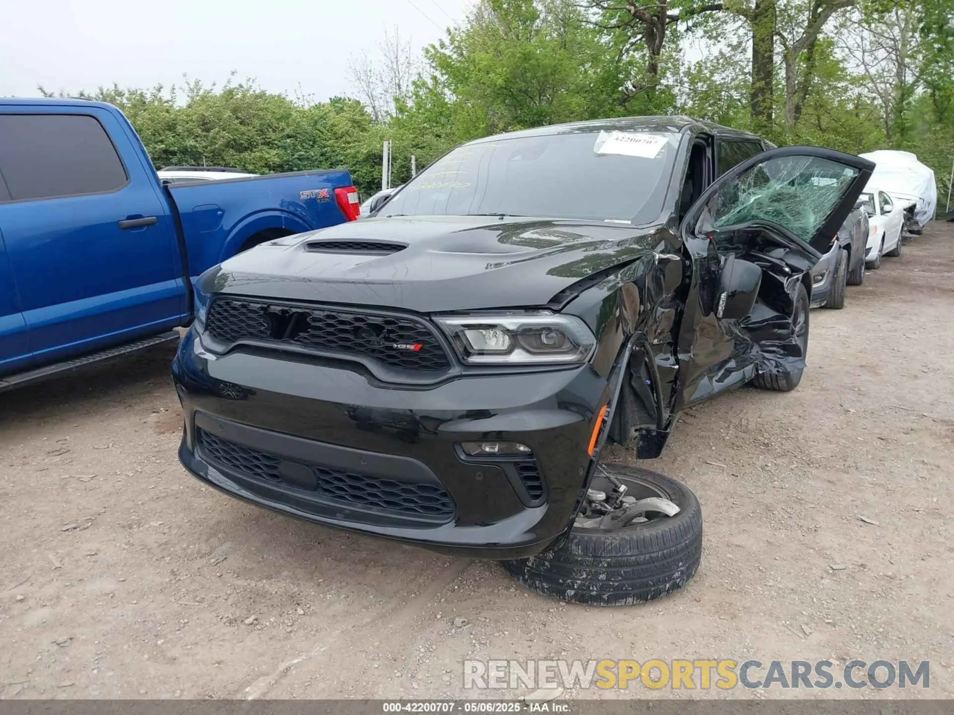2 fotografías del automóvil dañado 1C4SDHCT9NC192123 DODGE DURANGO 2022