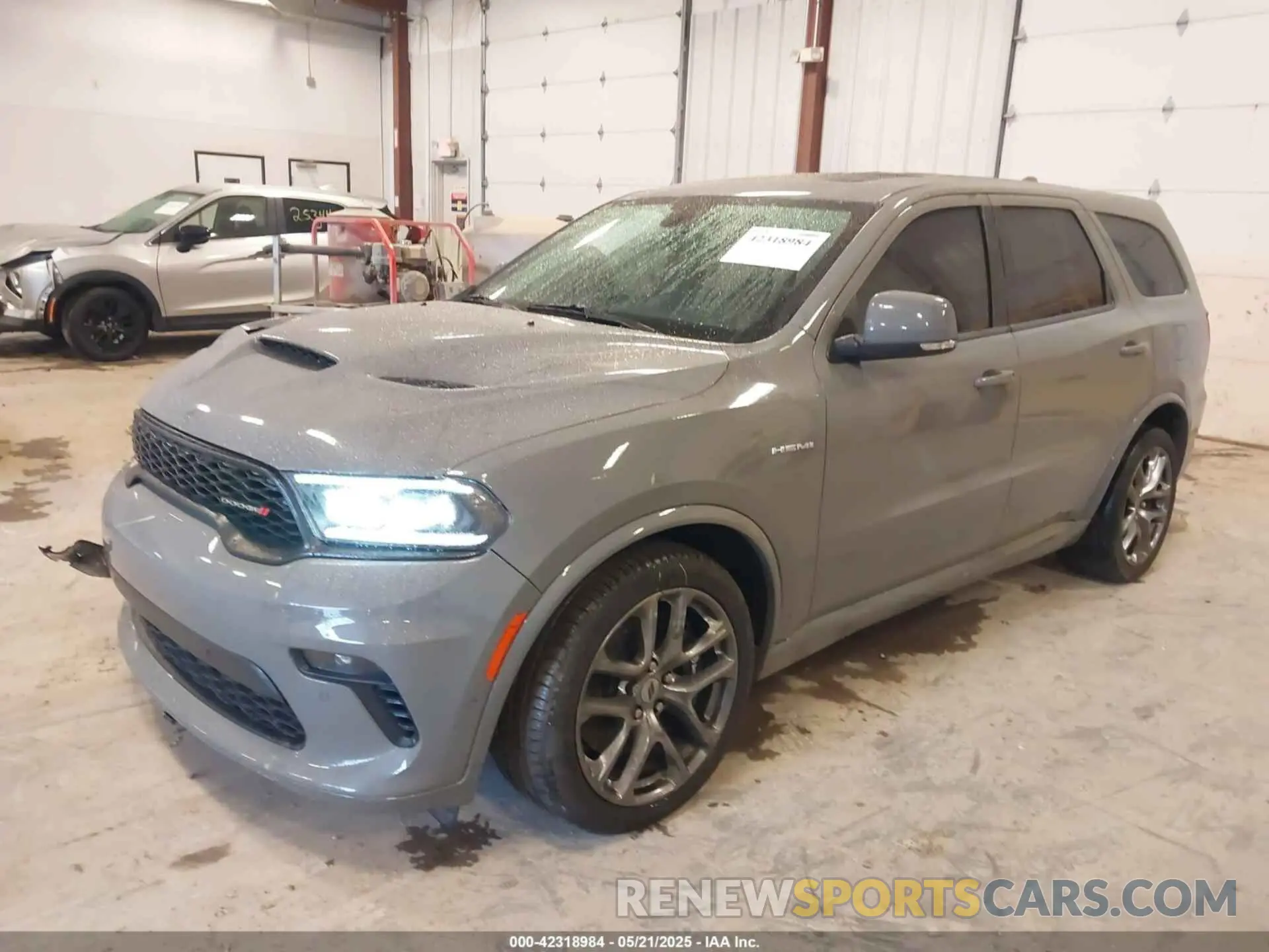 2 fotografías del automóvil dañado 1C4SDJCT7NC105441 DODGE DURANGO 2022