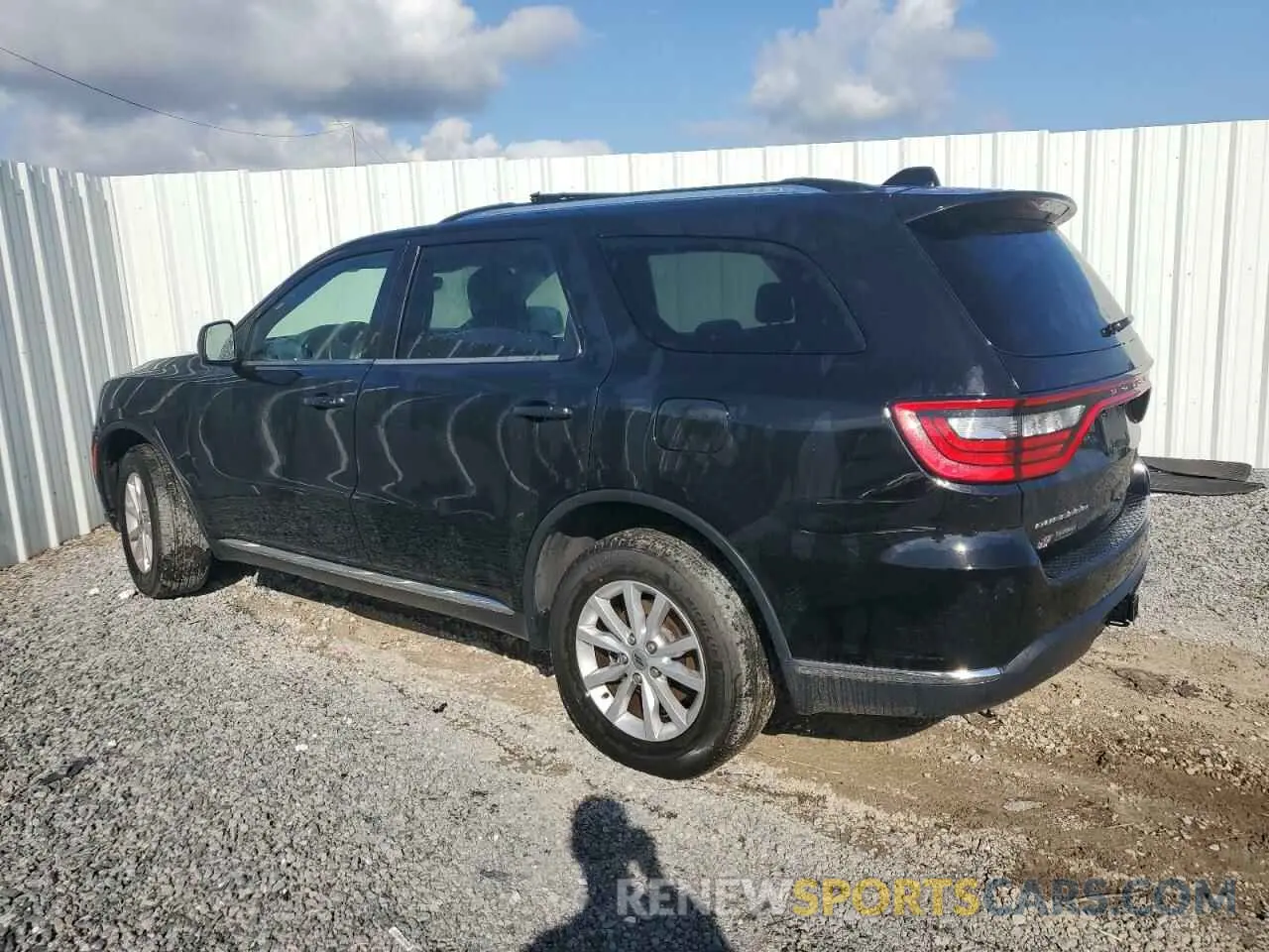 2 fotografías del automóvil dañado 1C4RDJAG0PC564883 DODGE DURANGO 2023