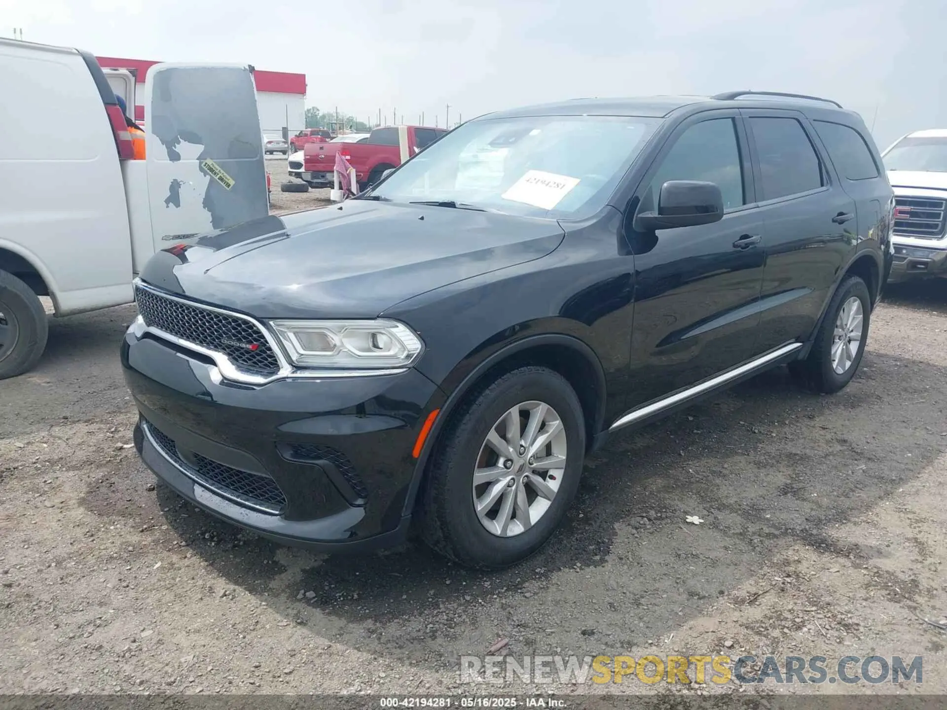 2 fotografías del automóvil dañado 1C4RDJAG0PC584678 DODGE DURANGO 2023