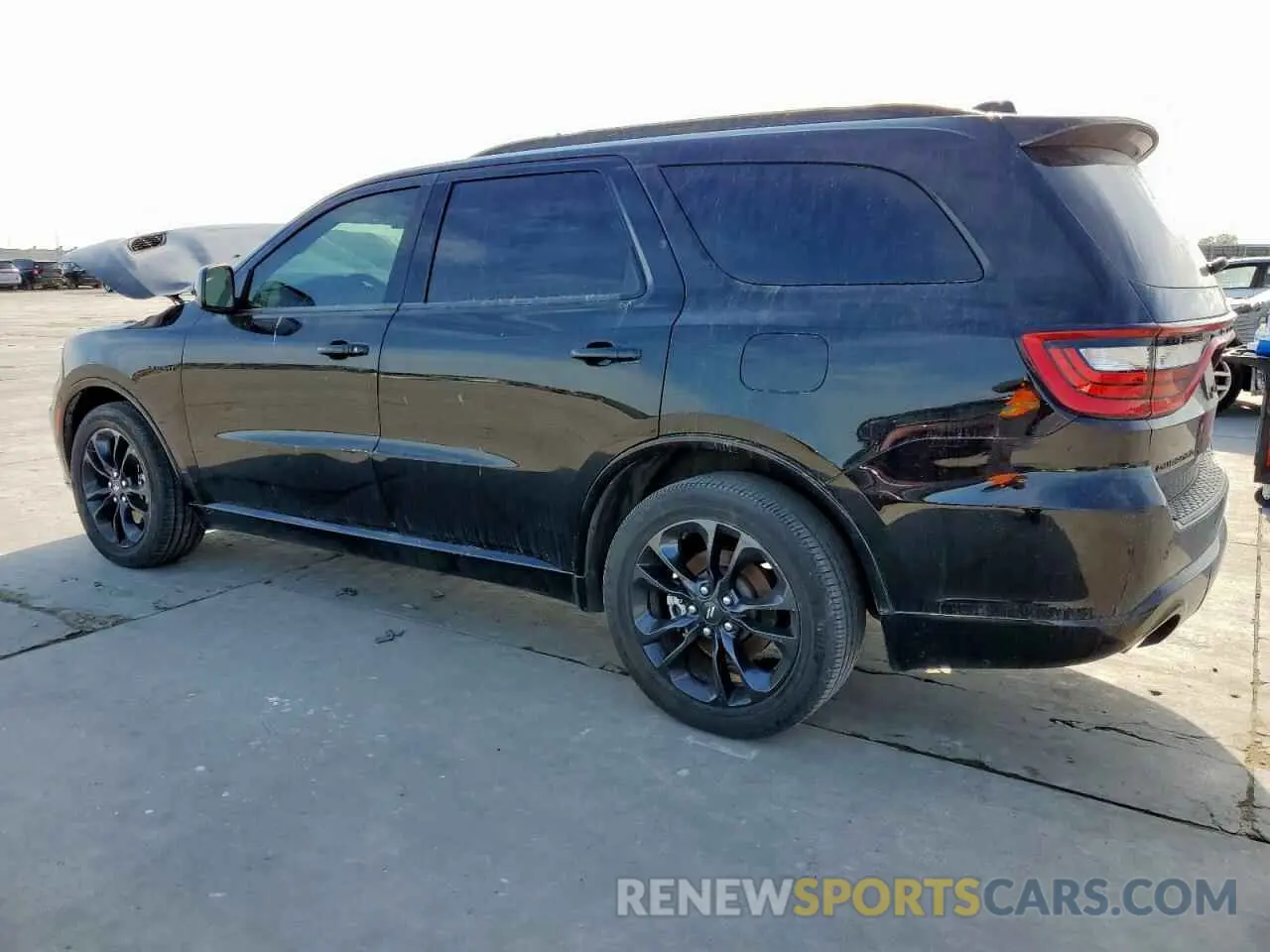2 fotografías del automóvil dañado 1C4SDHCT2PC720149 DODGE DURANGO 2023