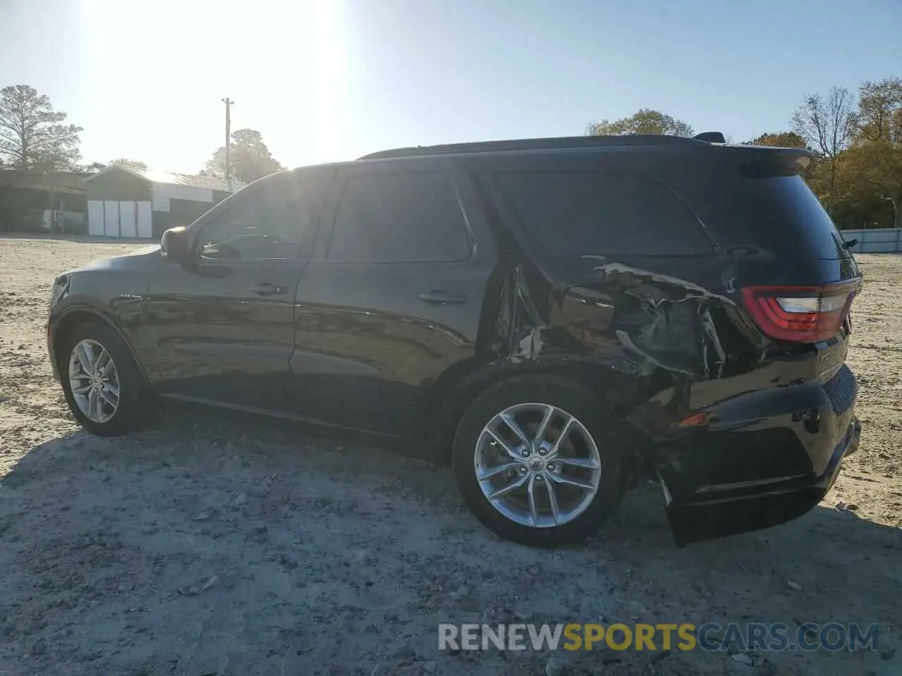 2 fotografías del automóvil dañado 1C4SDHCT9PC553370 DODGE DURANGO 2023