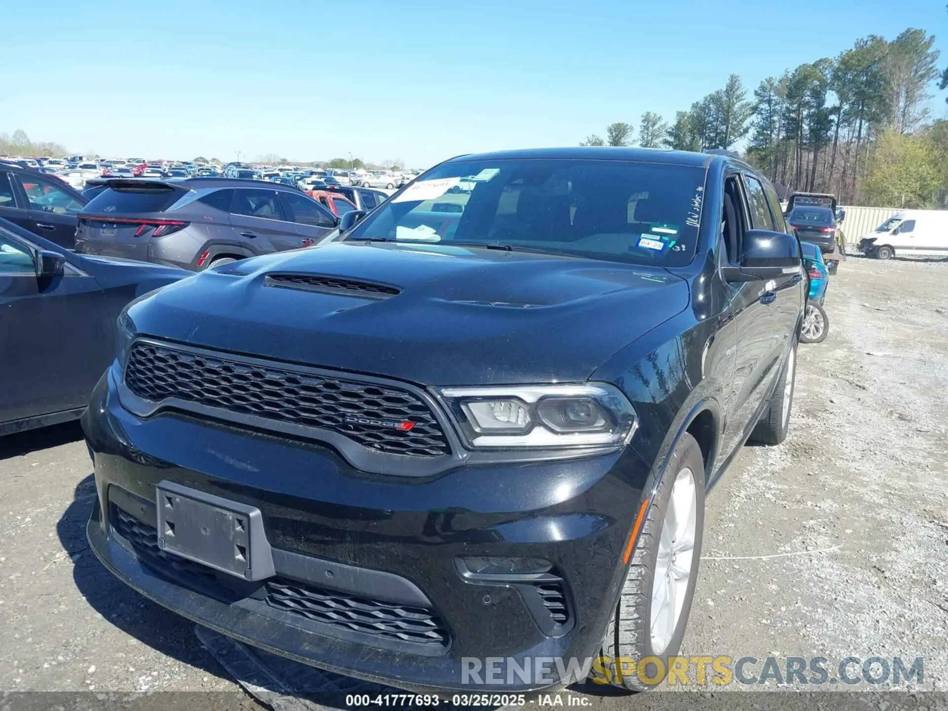2 fotografías del automóvil dañado 1C4SDHCTXPC553247 DODGE DURANGO 2023