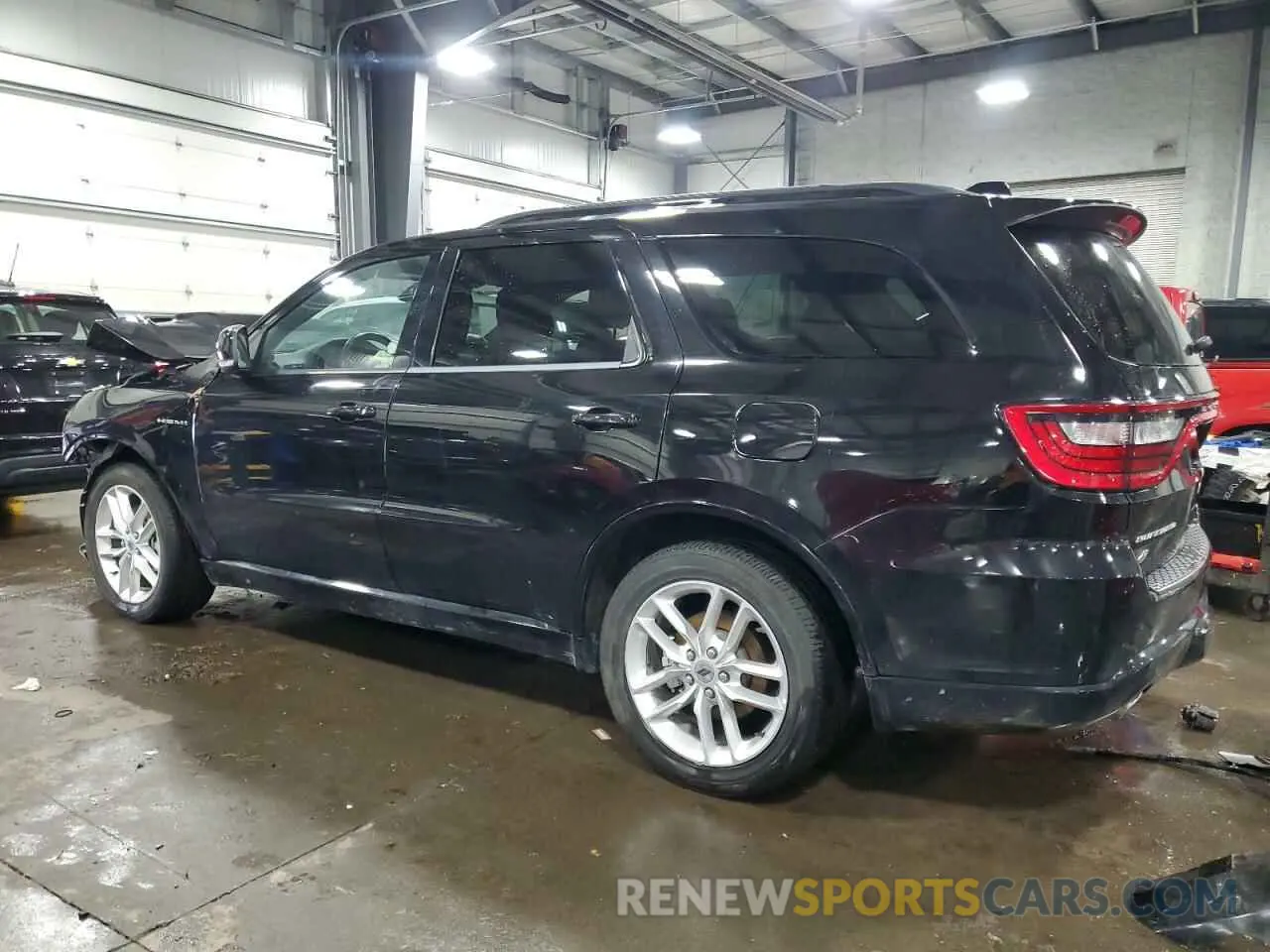 2 fotografías del automóvil dañado 1C4SDJCT2PC555842 DODGE DURANGO 2023