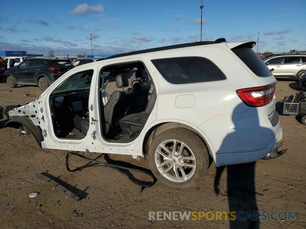 2 fotografías del automóvil dañado 1C4SDJCT5PC638584 DODGE DURANGO 2023