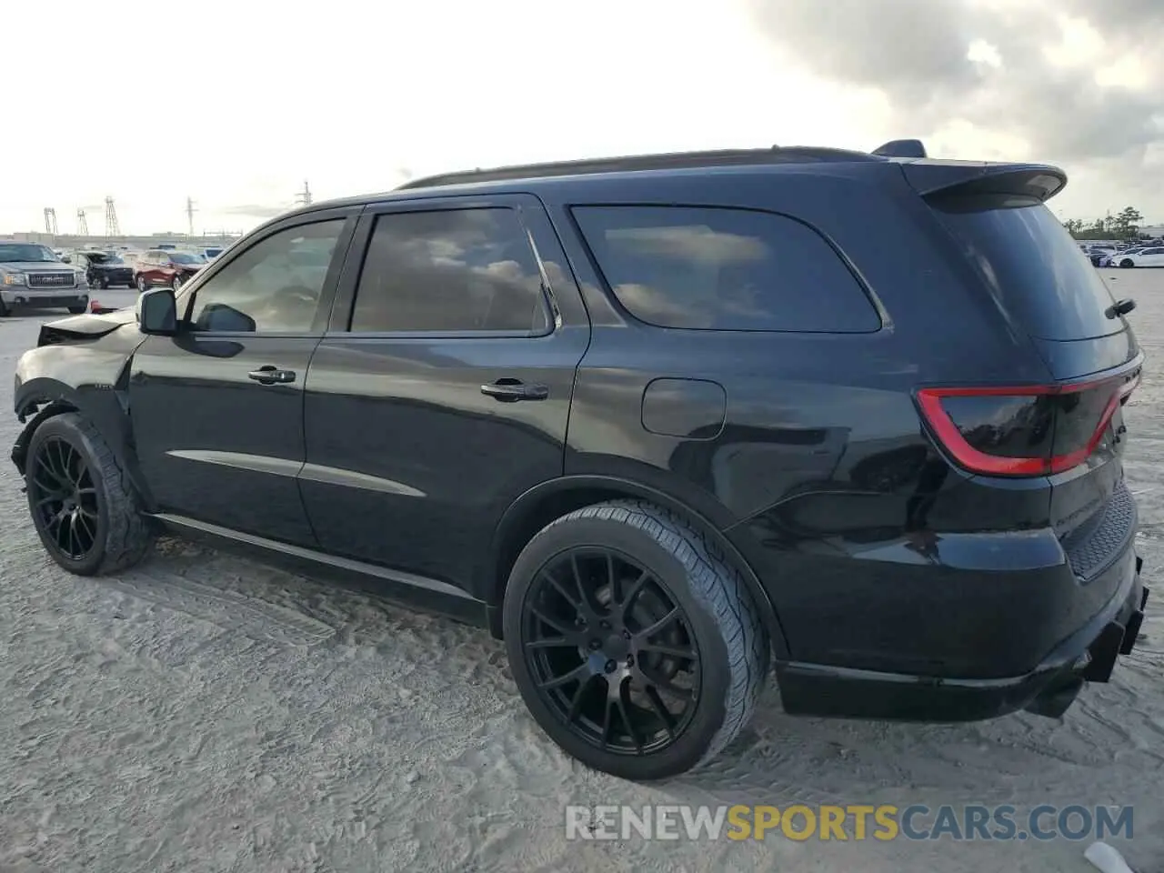2 fotografías del automóvil dañado 1C4SDJCT5PC695772 DODGE DURANGO 2023