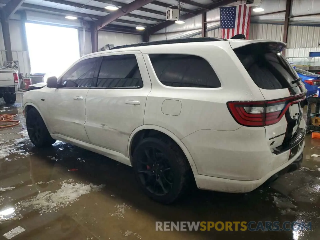 2 fotografías del automóvil dañado 1C4SDJGJ9PC585610 DODGE DURANGO 2023