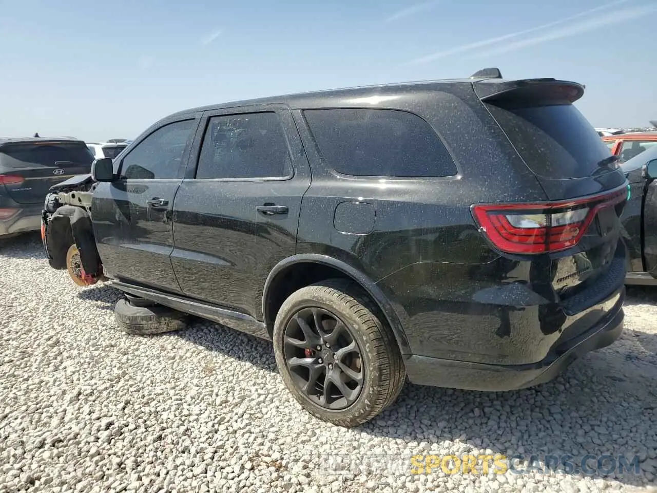 2 fotografías del automóvil dañado 1C4SDJH95PC689550 DODGE DURANGO 2023